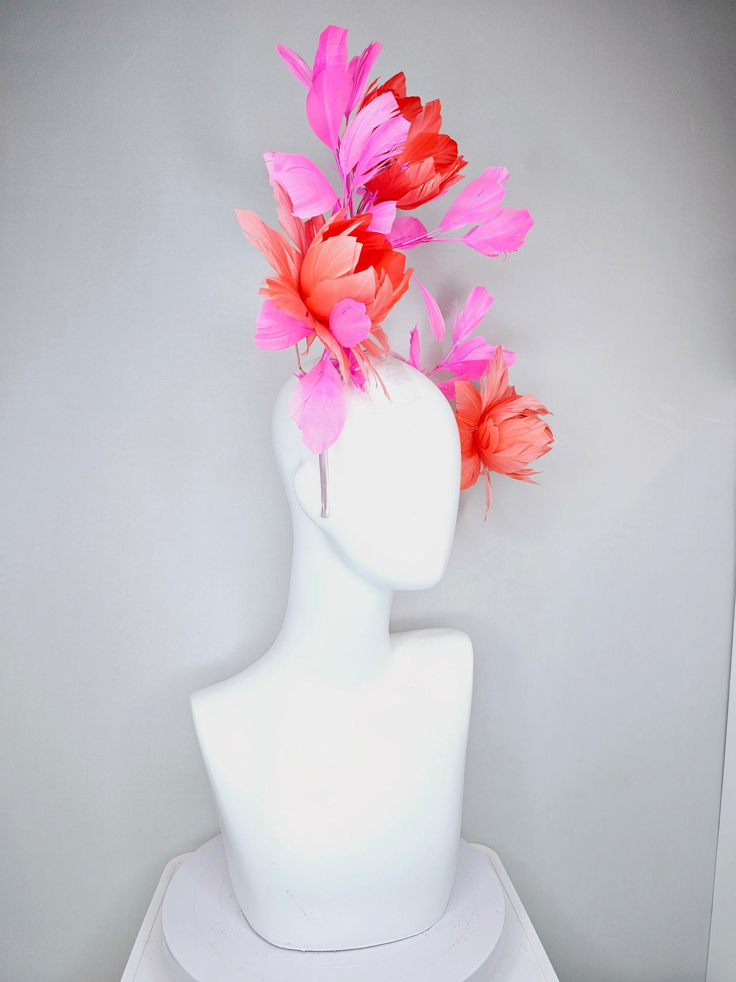 kentucky derby hat fascinator large fluffy coral orange feather flowers with pink feathers