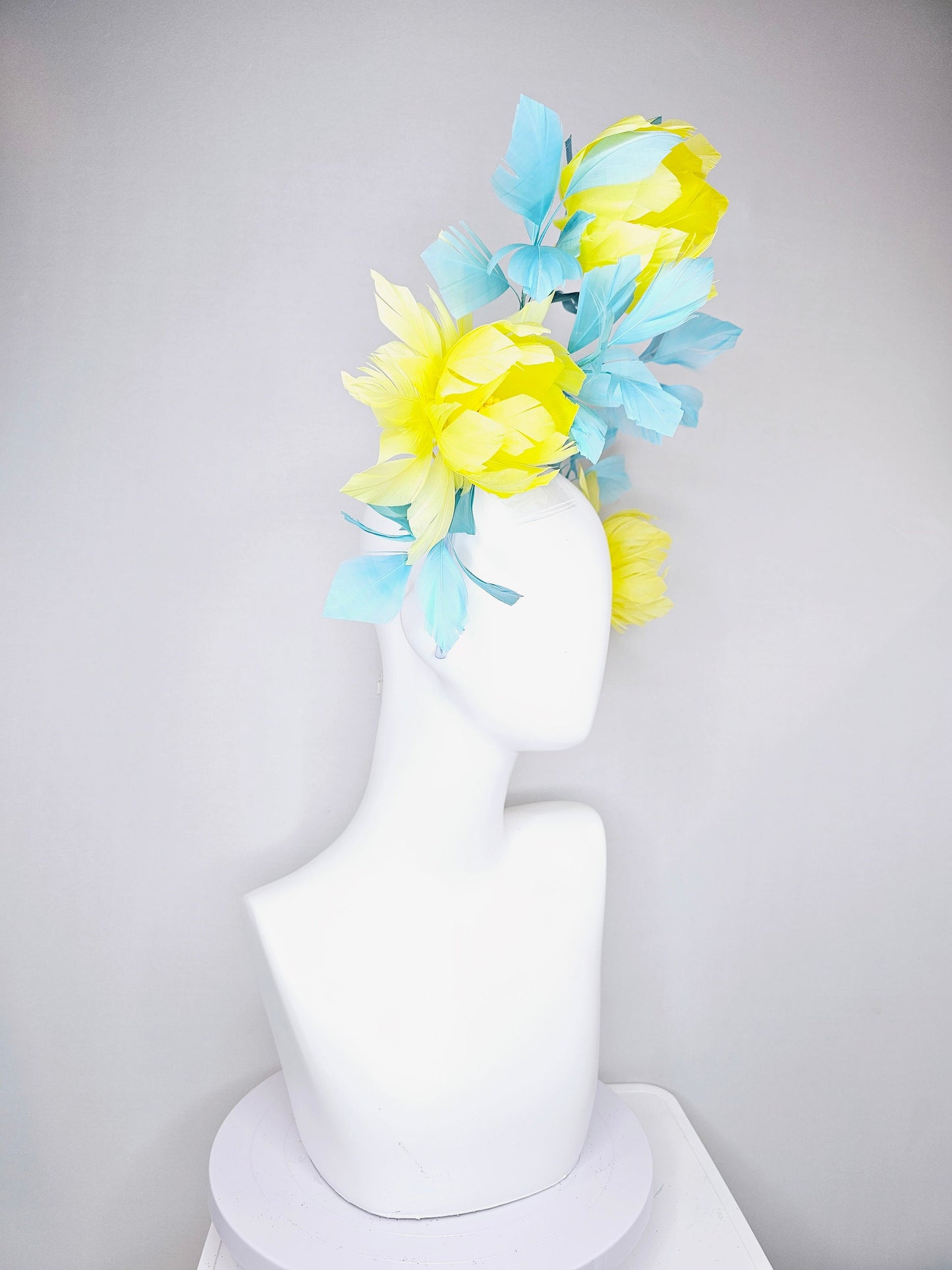 kentucky derby hat fascinator large fluffy yellow feather flowers with peacock blue teal feathers