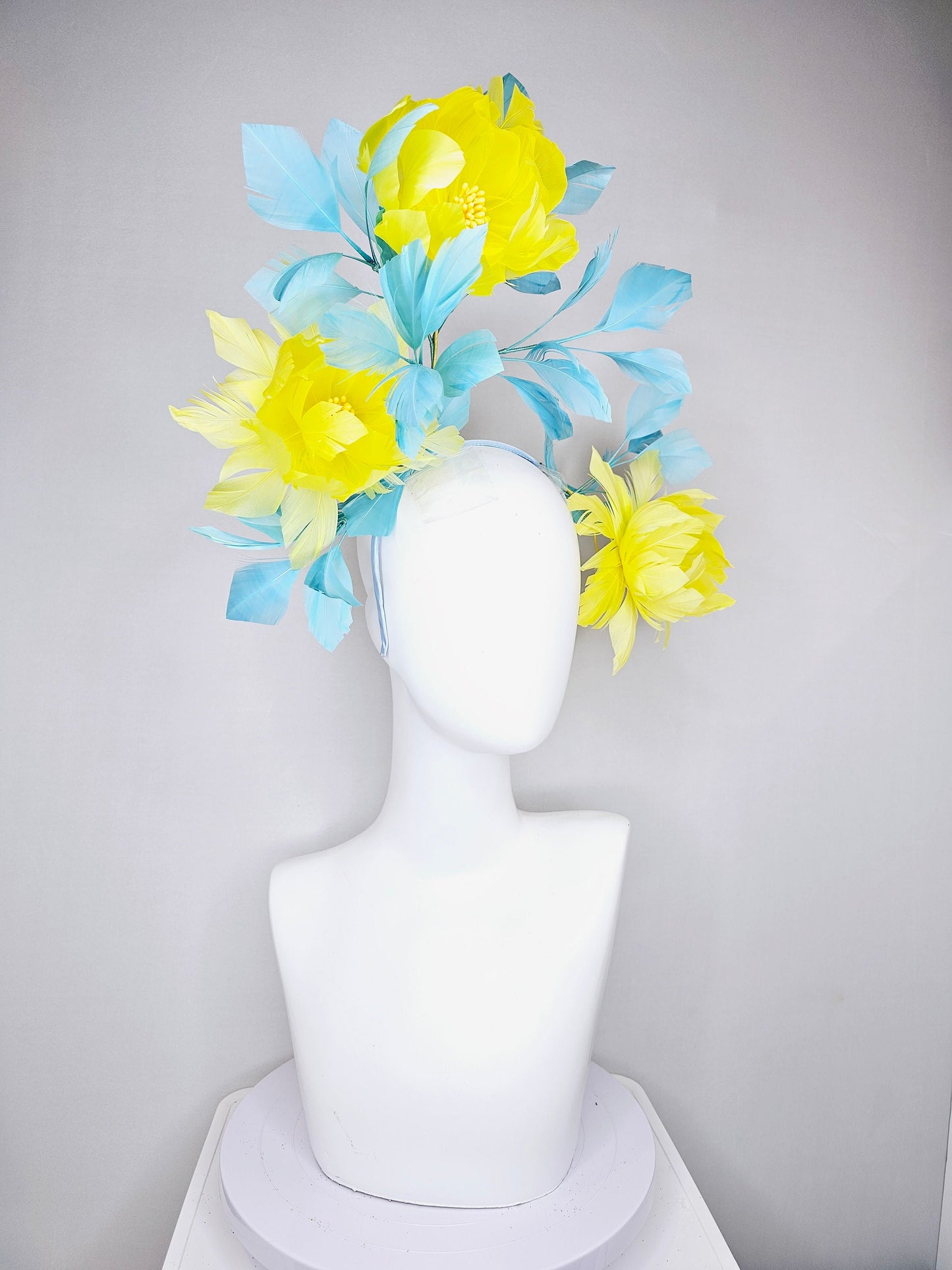 kentucky derby hat fascinator large fluffy yellow feather flowers with peacock blue teal feathers