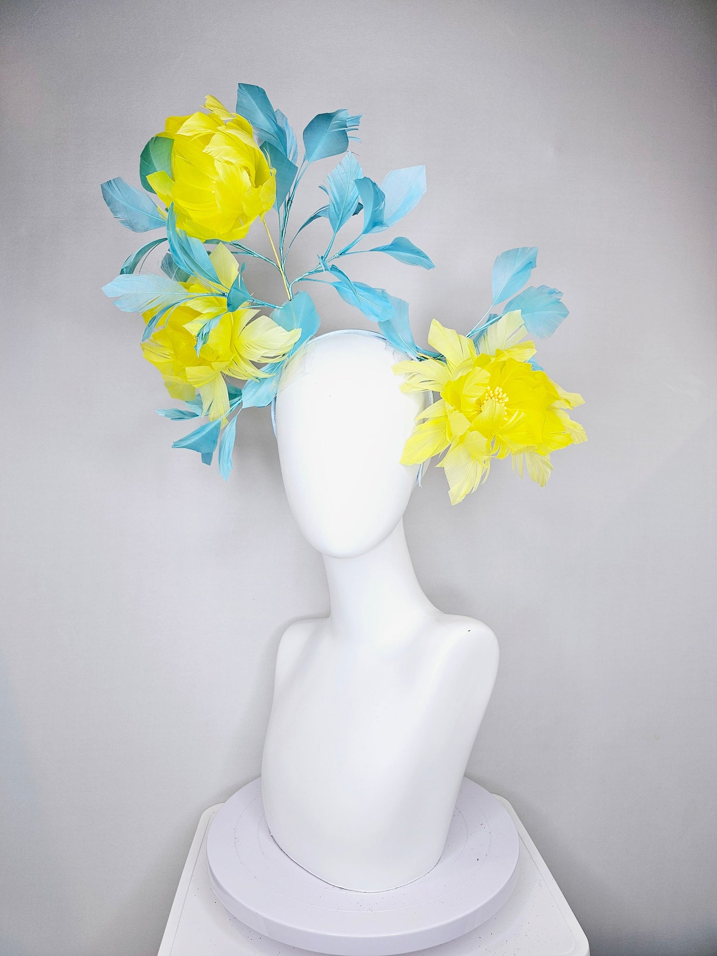 kentucky derby hat fascinator large fluffy yellow feather flowers with peacock blue teal feathers