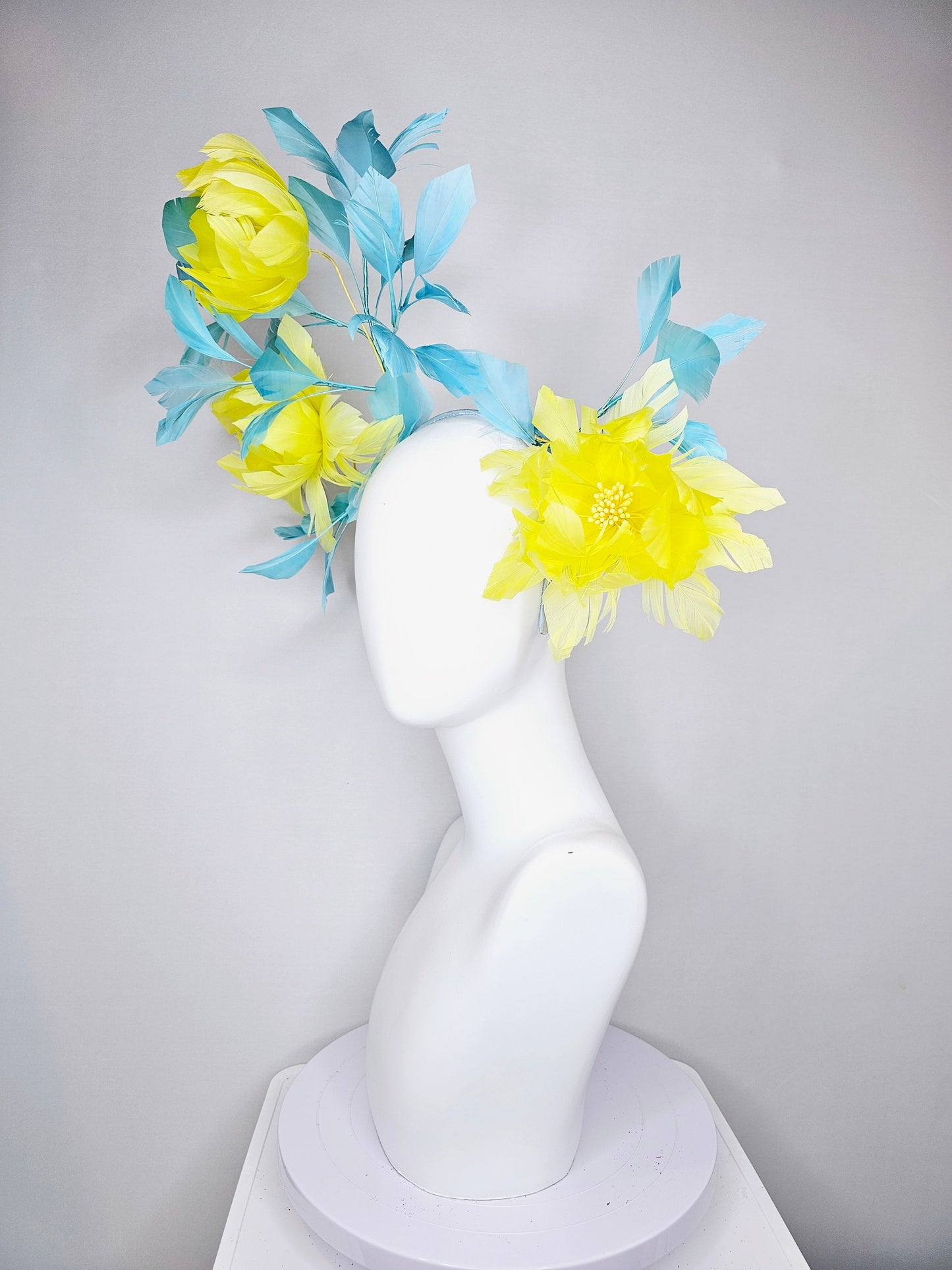 kentucky derby hat fascinator large fluffy yellow feather flowers with peacock blue teal feathers