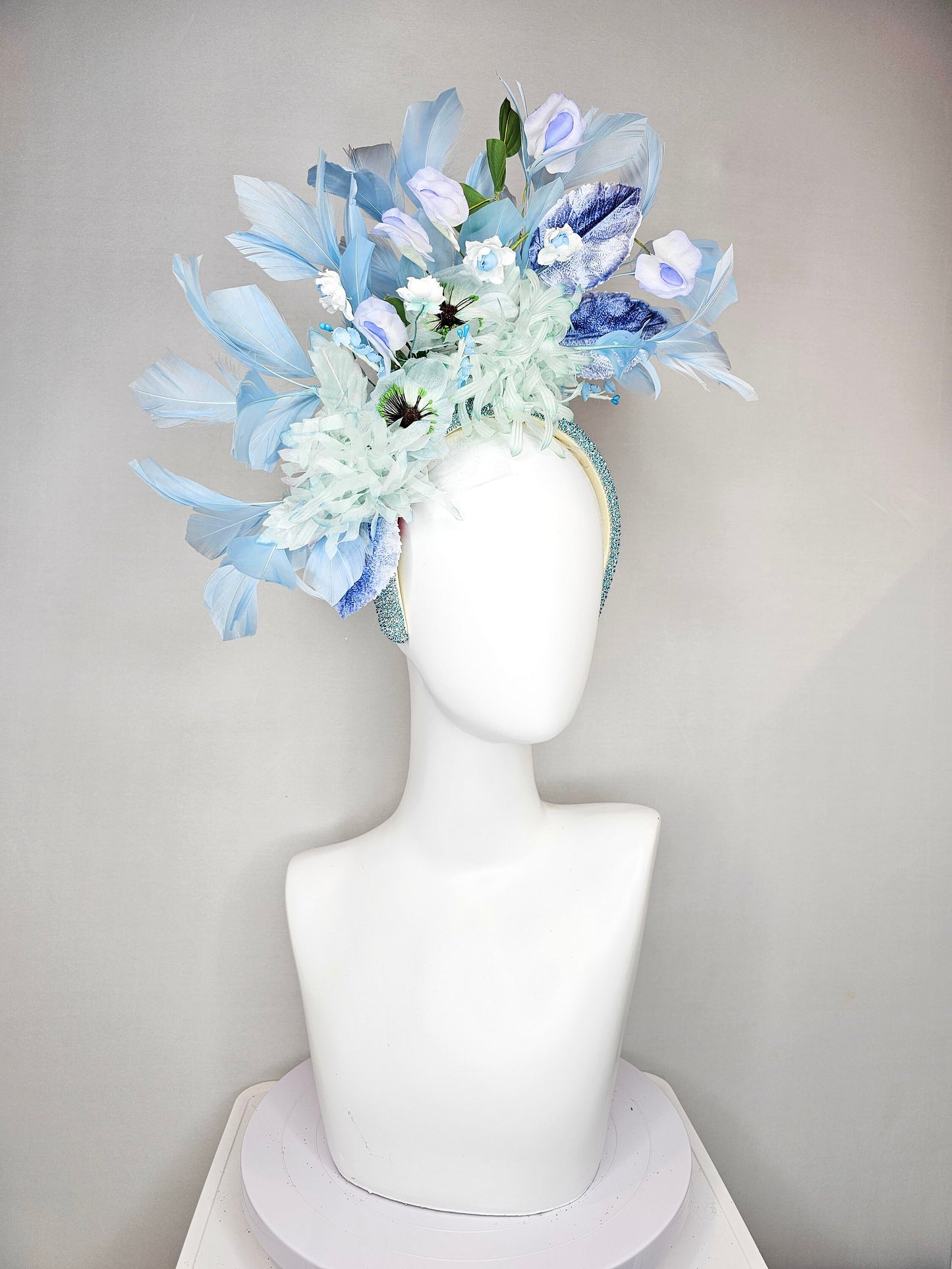 kentucky derby hat fascinator blue rhinestone crystal headband with light green mint and blue silk flowers and leaves light blue feathers