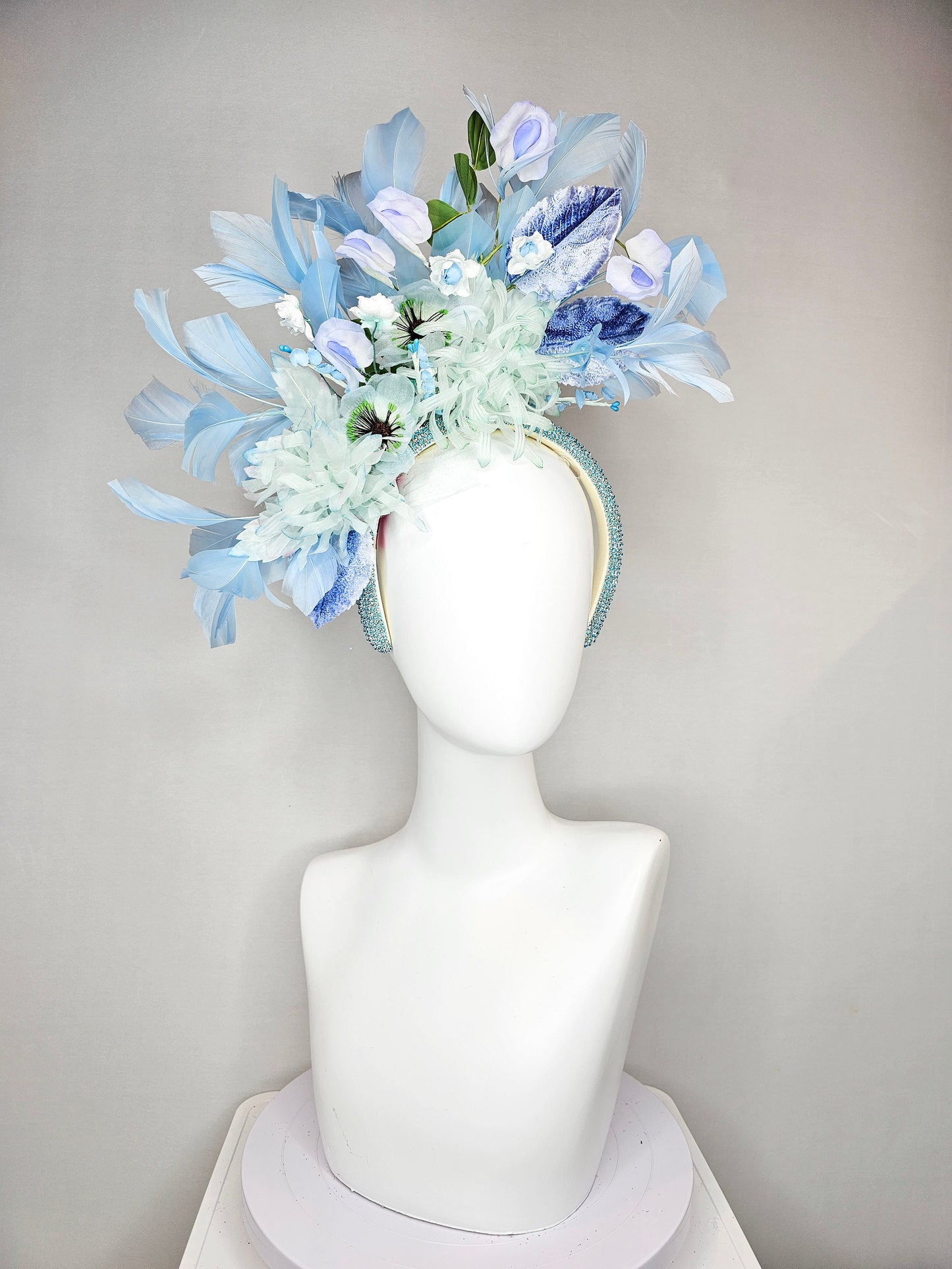 kentucky derby hat fascinator blue rhinestone crystal headband with light green mint and blue silk flowers and leaves light blue feathers