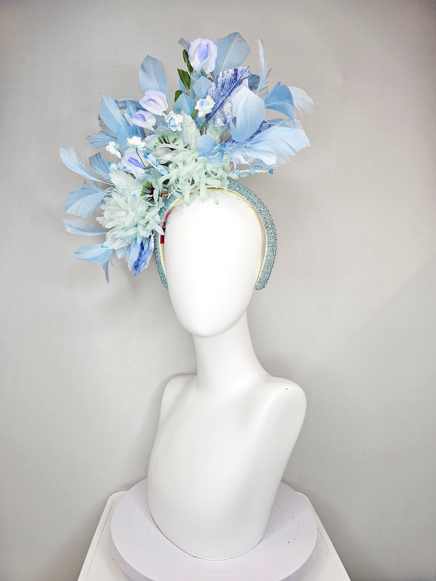 kentucky derby hat fascinator blue rhinestone crystal headband with light green mint and blue silk flowers and leaves light blue feathers