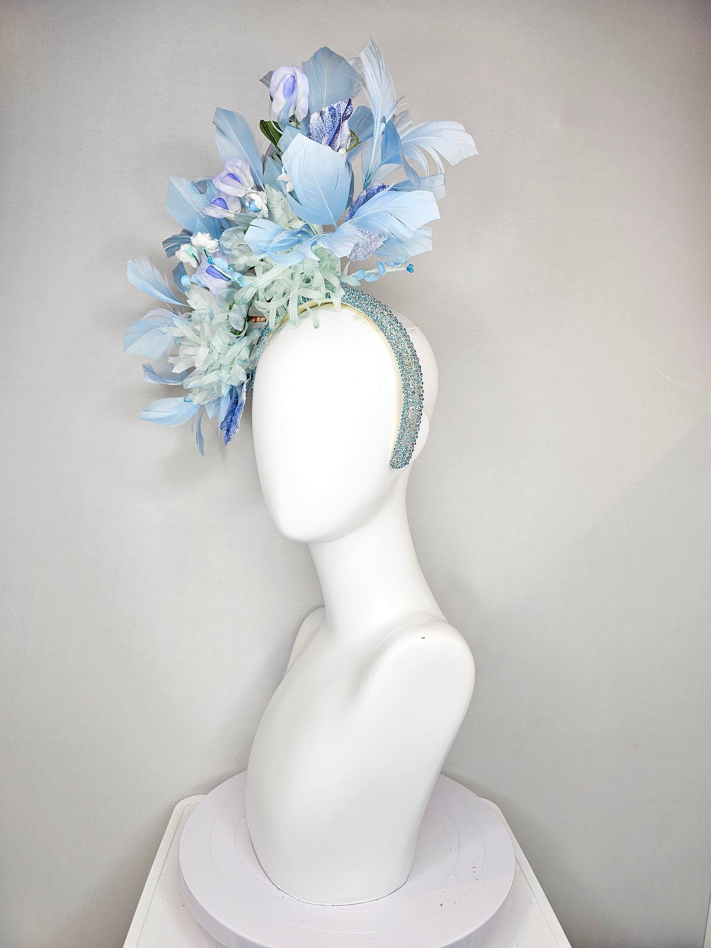 kentucky derby hat fascinator blue rhinestone crystal headband with light green mint and blue silk flowers and leaves light blue feathers