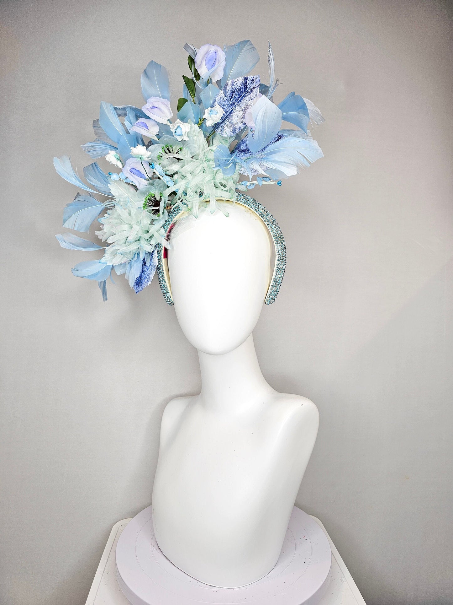 kentucky derby hat fascinator blue rhinestone crystal headband with light green mint and blue silk flowers and leaves light blue feathers