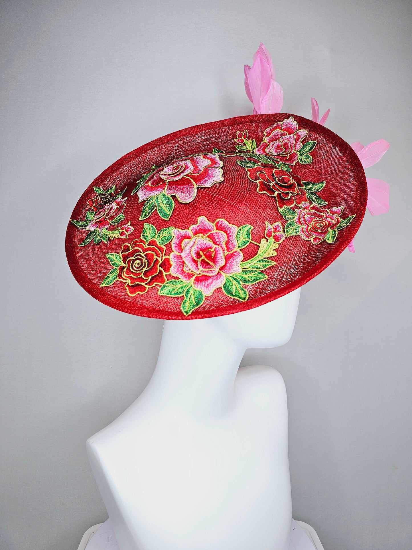 kentucky derby hat fascinator red sinamay saucer with red green gold  embroidered flowers pink and red feathers