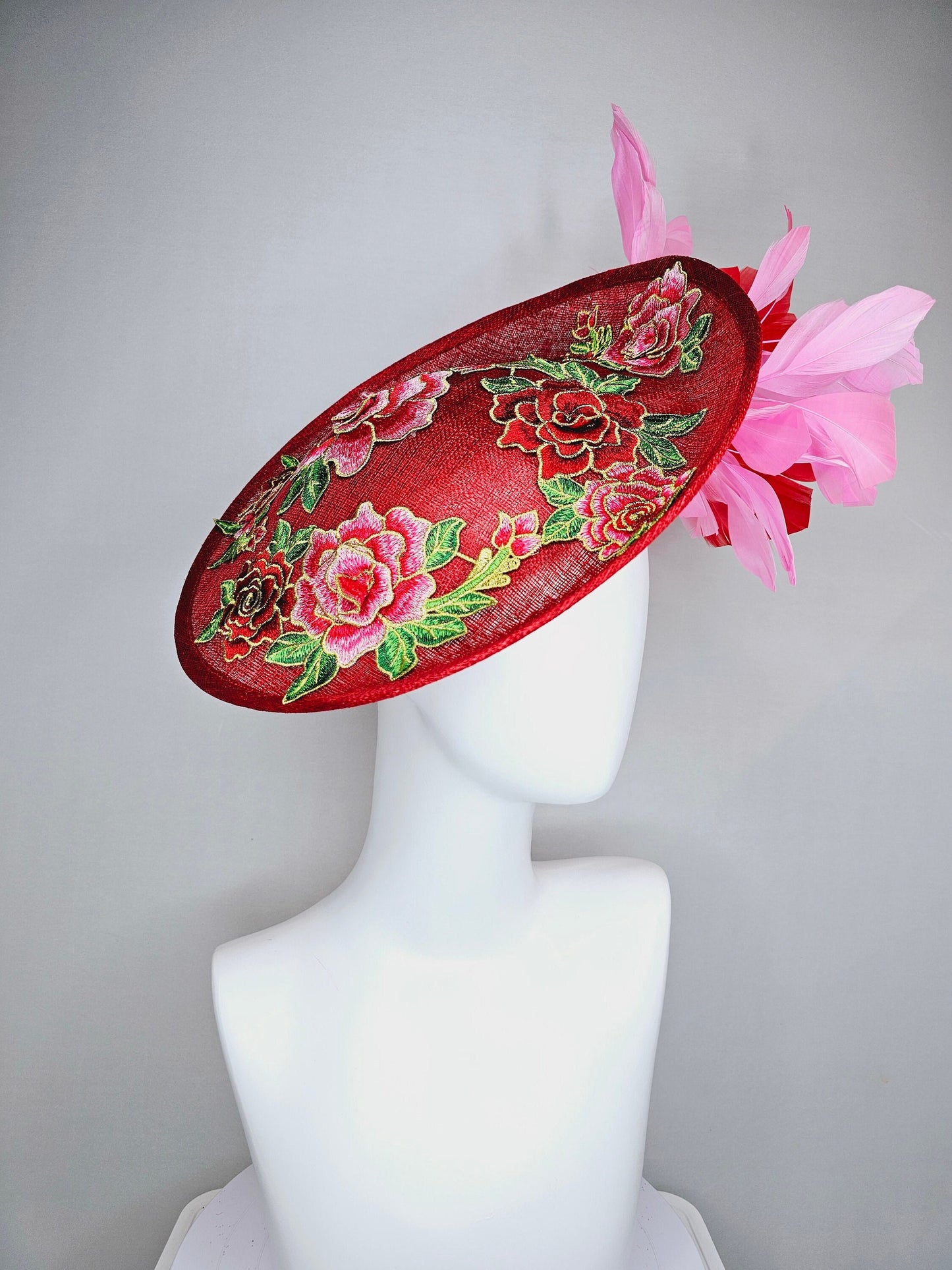 kentucky derby hat fascinator red sinamay saucer with red green gold  embroidered flowers pink and red feathers