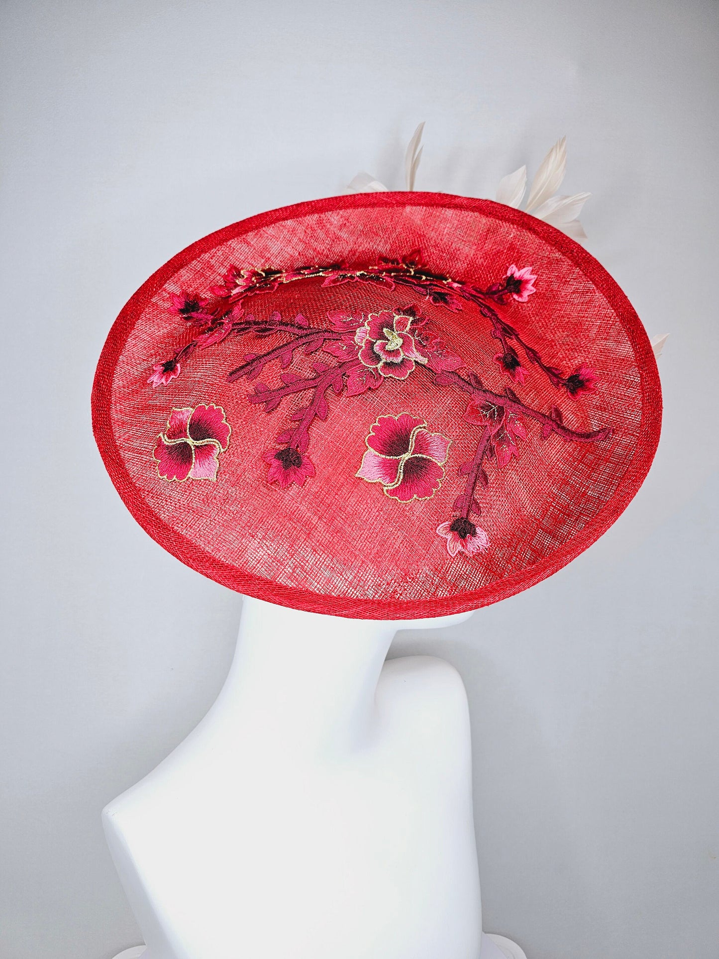 kentucky derby hat red sinamay saucer with red burgundy gold pink embroidered flowers with blush light pink red feathers