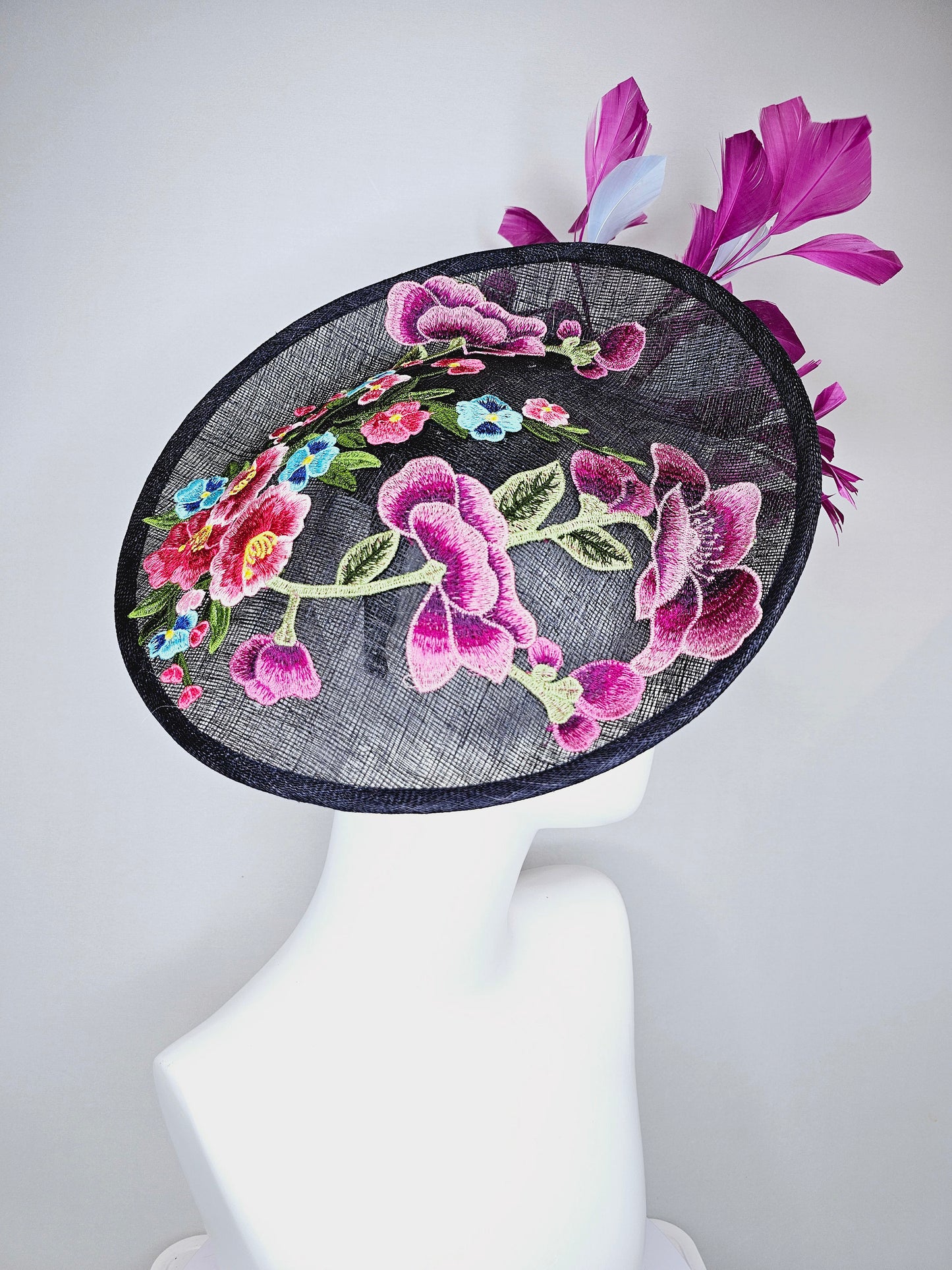 kentucky derby hat navy sinamay saucer with purple lavender pink embroidered flowers with purple and light blue feathers