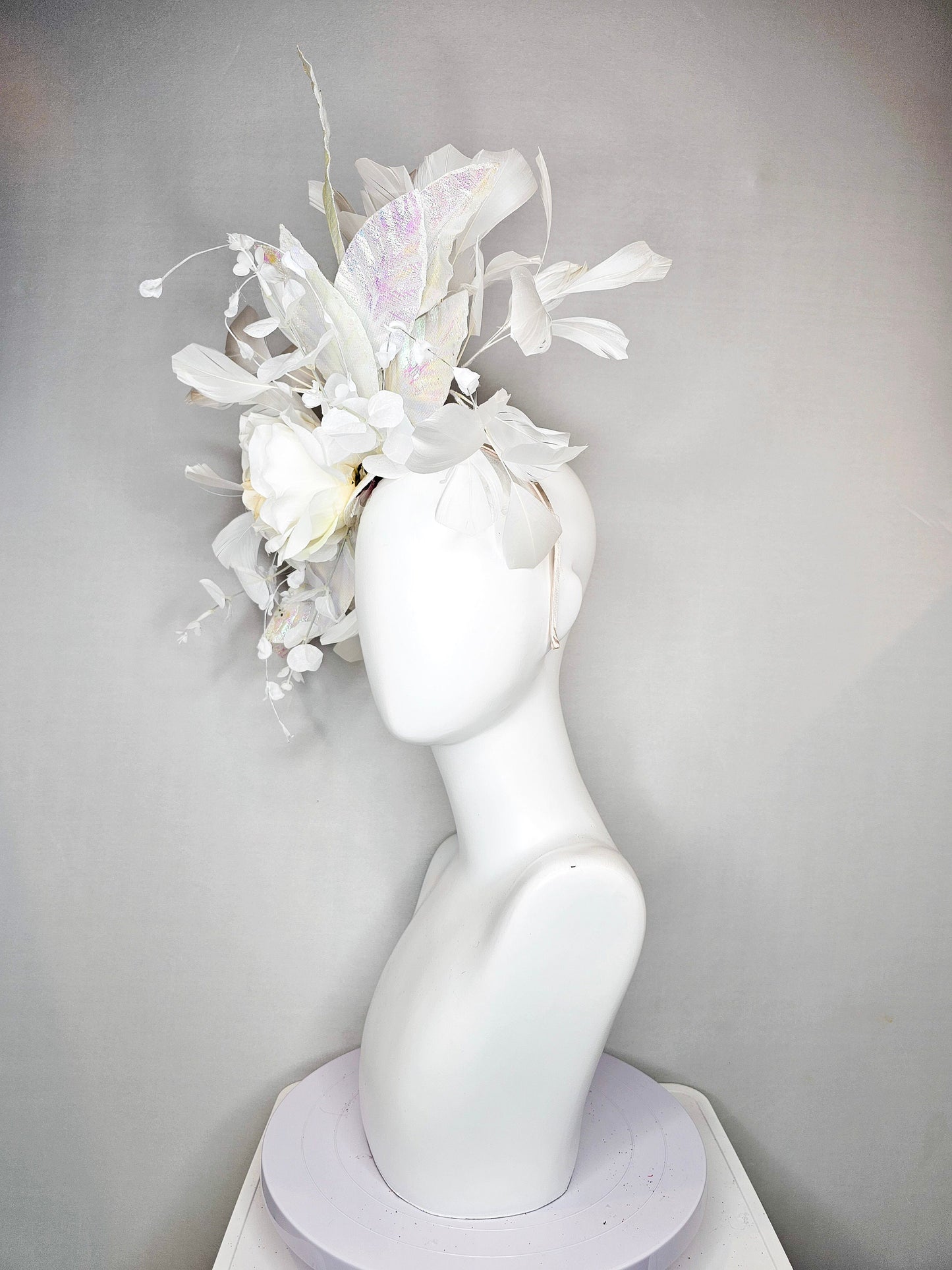 kentucky derby hat fascinator white ivory rose flower with white iridescent pastel rainbow leaves white pearls white feathers