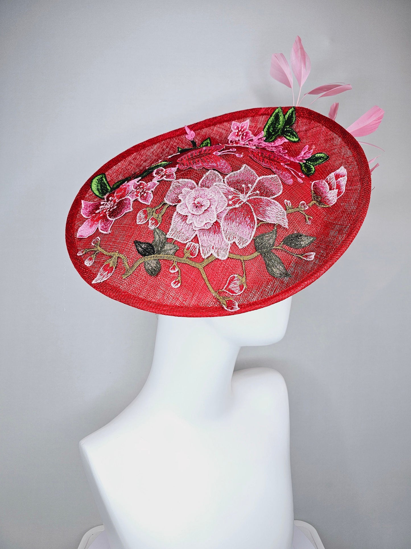 kentucky derby hat fascinator red sinamay saucer with red pink green gold  embroidered flowers pink feathers