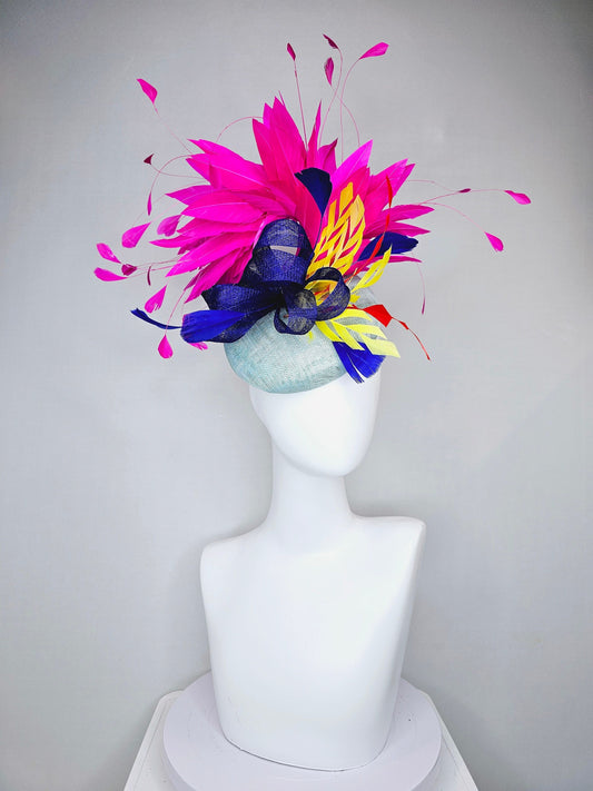 kentucky derby hat fascinator  light blue sinamay  large hot pink feathers royal blue sinamay bow  and yellow and red cut feathers