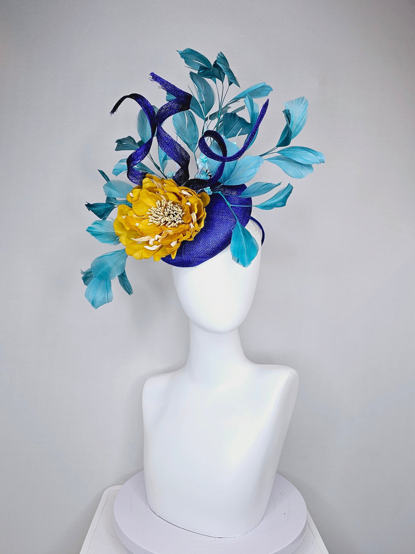 kentucky derby hat fascinator royal blue sinamay with curls mustard yellow large flower with teal peacock blue  feathers