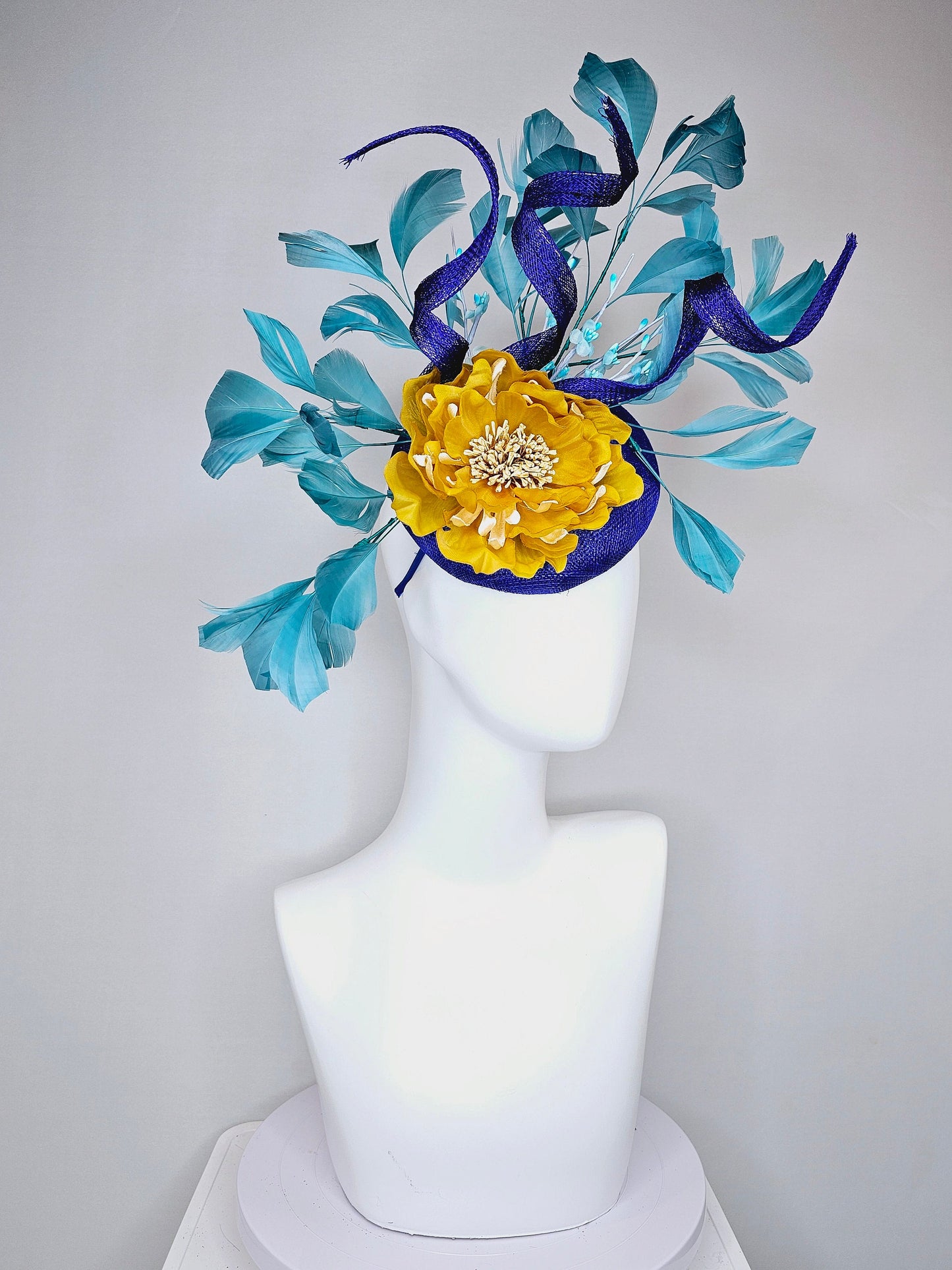 kentucky derby hat fascinator royal blue sinamay with curls mustard yellow large flower with teal peacock blue  feathers