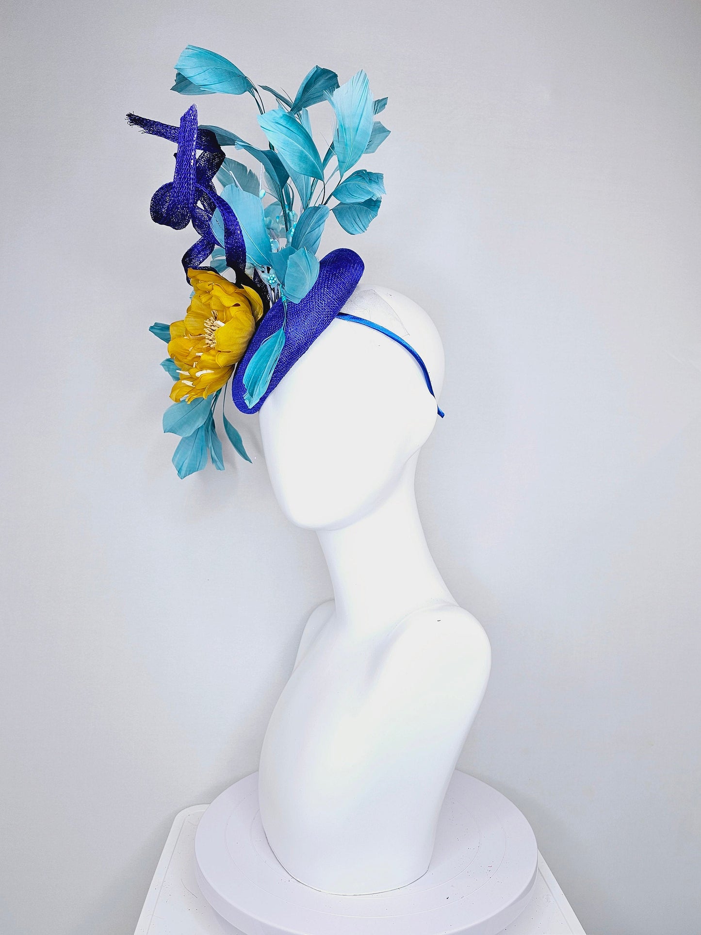 kentucky derby hat fascinator royal blue sinamay with curls mustard yellow large flower with teal peacock blue  feathers