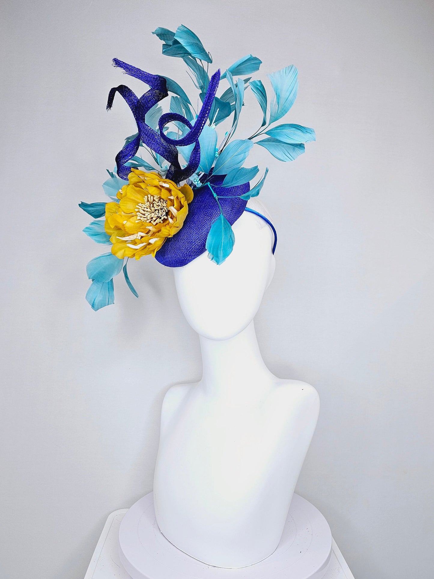 kentucky derby hat fascinator royal blue sinamay with curls mustard yellow large flower with teal peacock blue  feathers