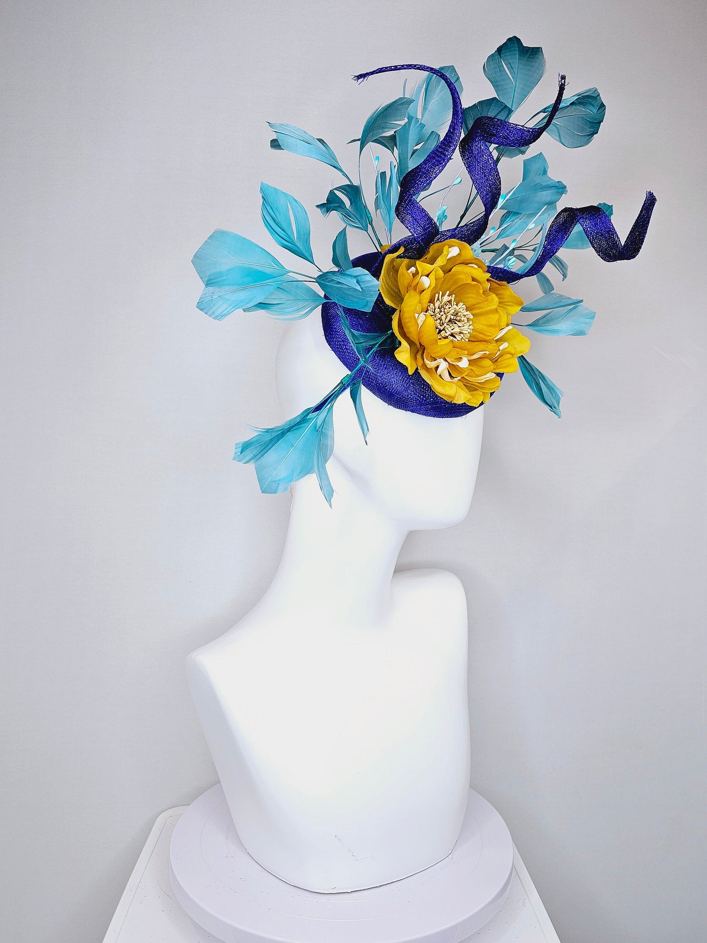 kentucky derby hat fascinator royal blue sinamay with curls mustard yellow large flower with teal peacock blue  feathers