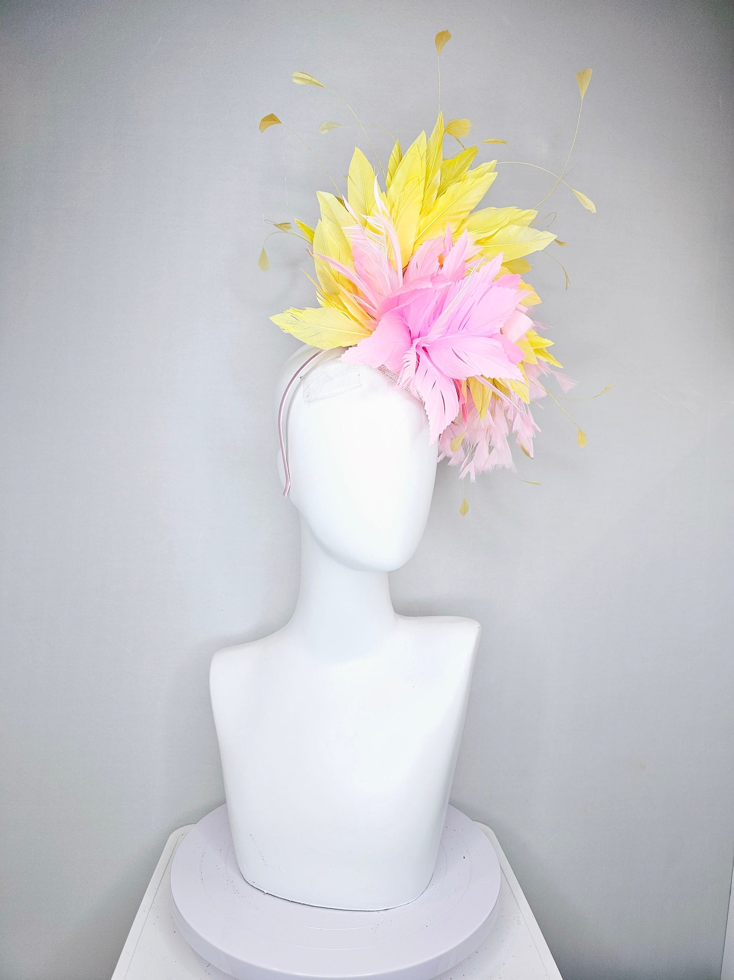 kentucky derby hat fascinator blush pink sinamay with pink feather flower and feathers with yellow feathers