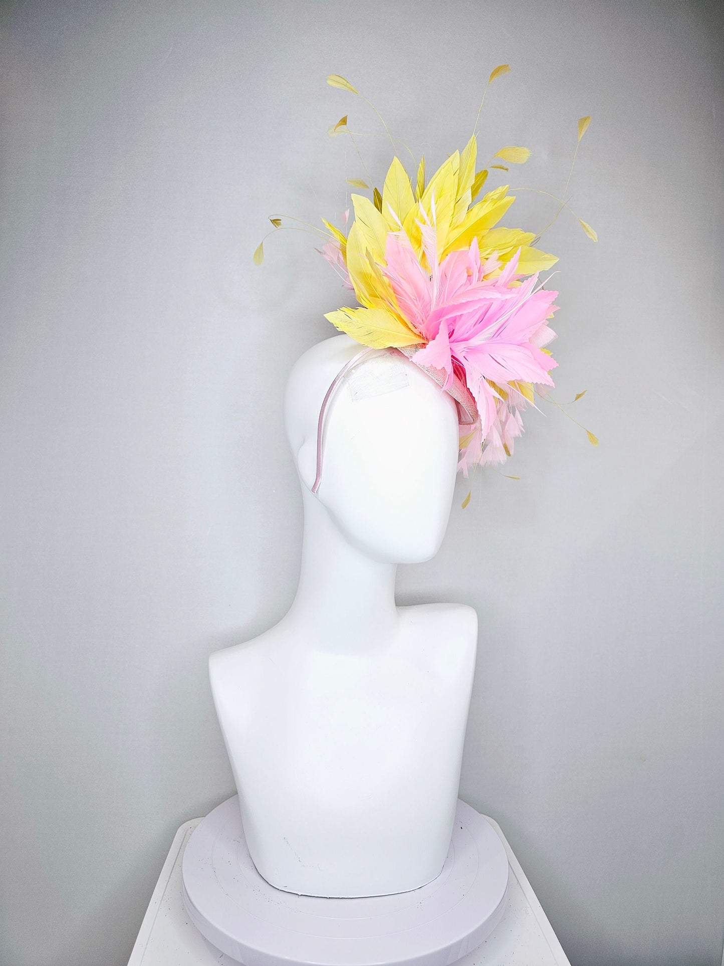 kentucky derby hat fascinator blush pink sinamay with pink feather flower and feathers with yellow feathers