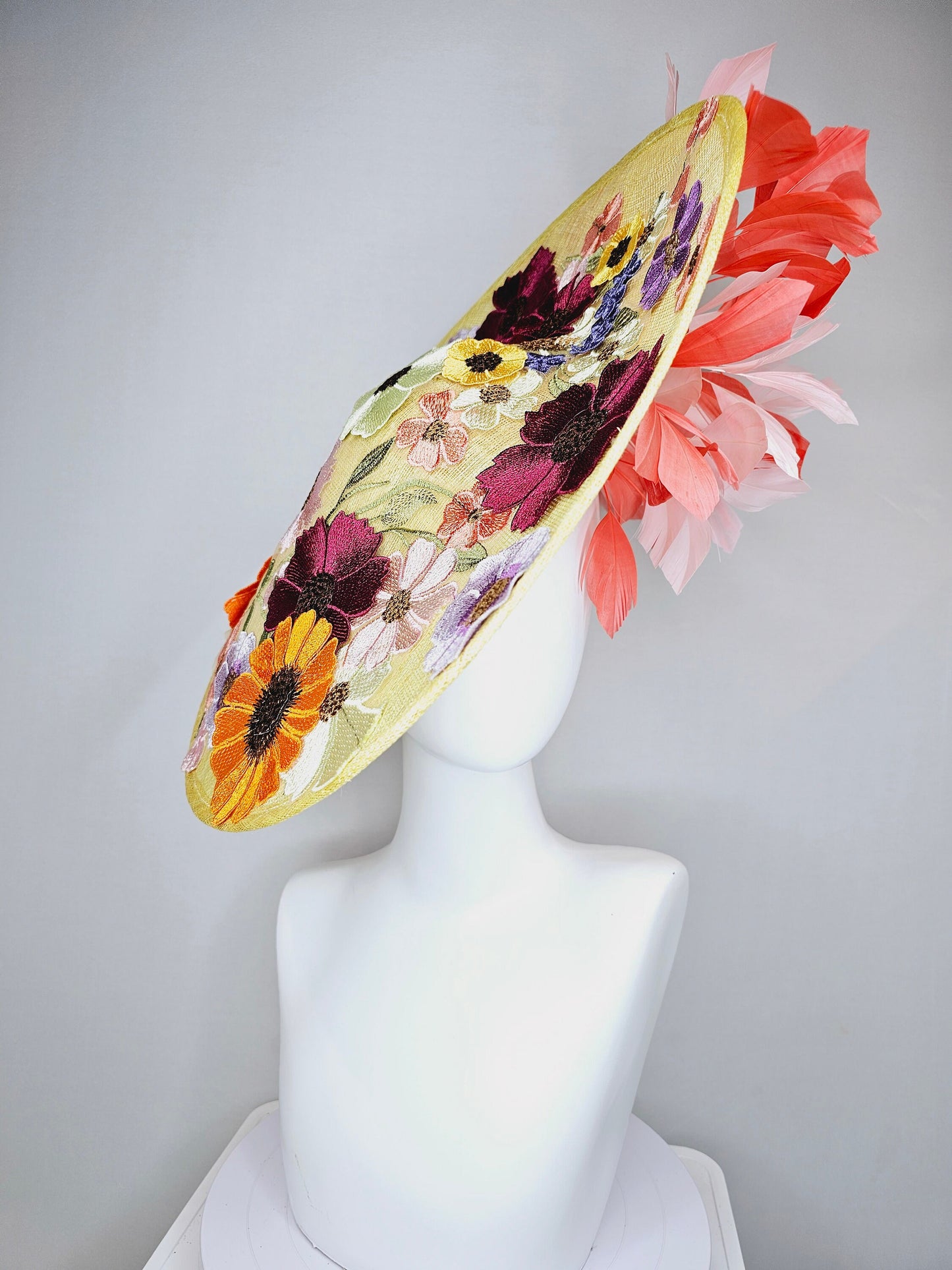 kentucky derby hat fascinator large yellow saucer sinamay rainbow red orange green pink embroidered flowers  pink coral branching feathers