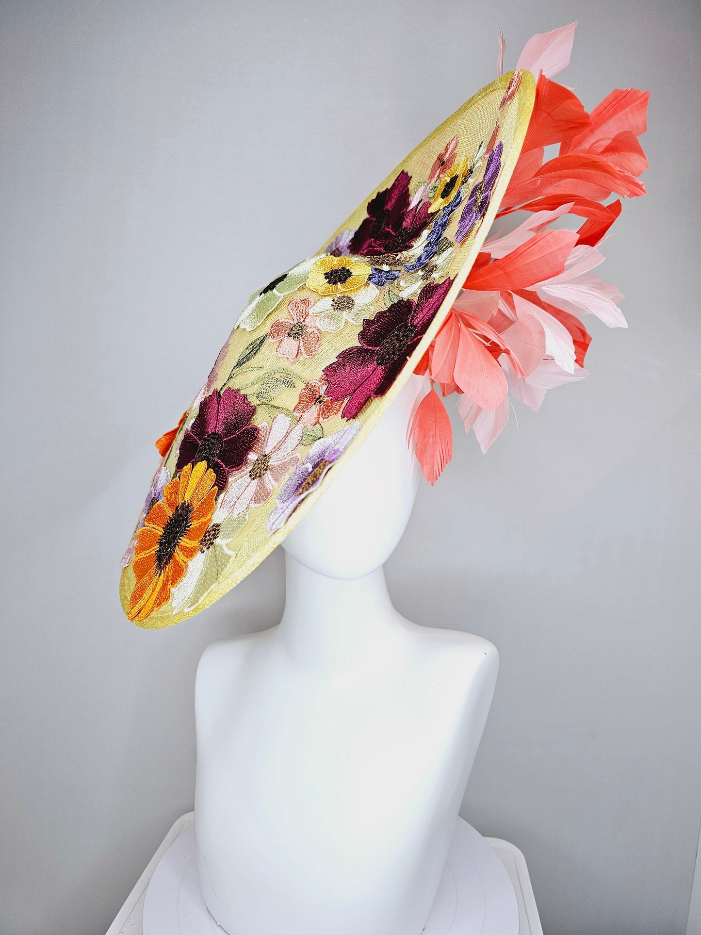 kentucky derby hat fascinator large yellow saucer sinamay rainbow red orange green pink embroidered flowers  pink coral branching feathers