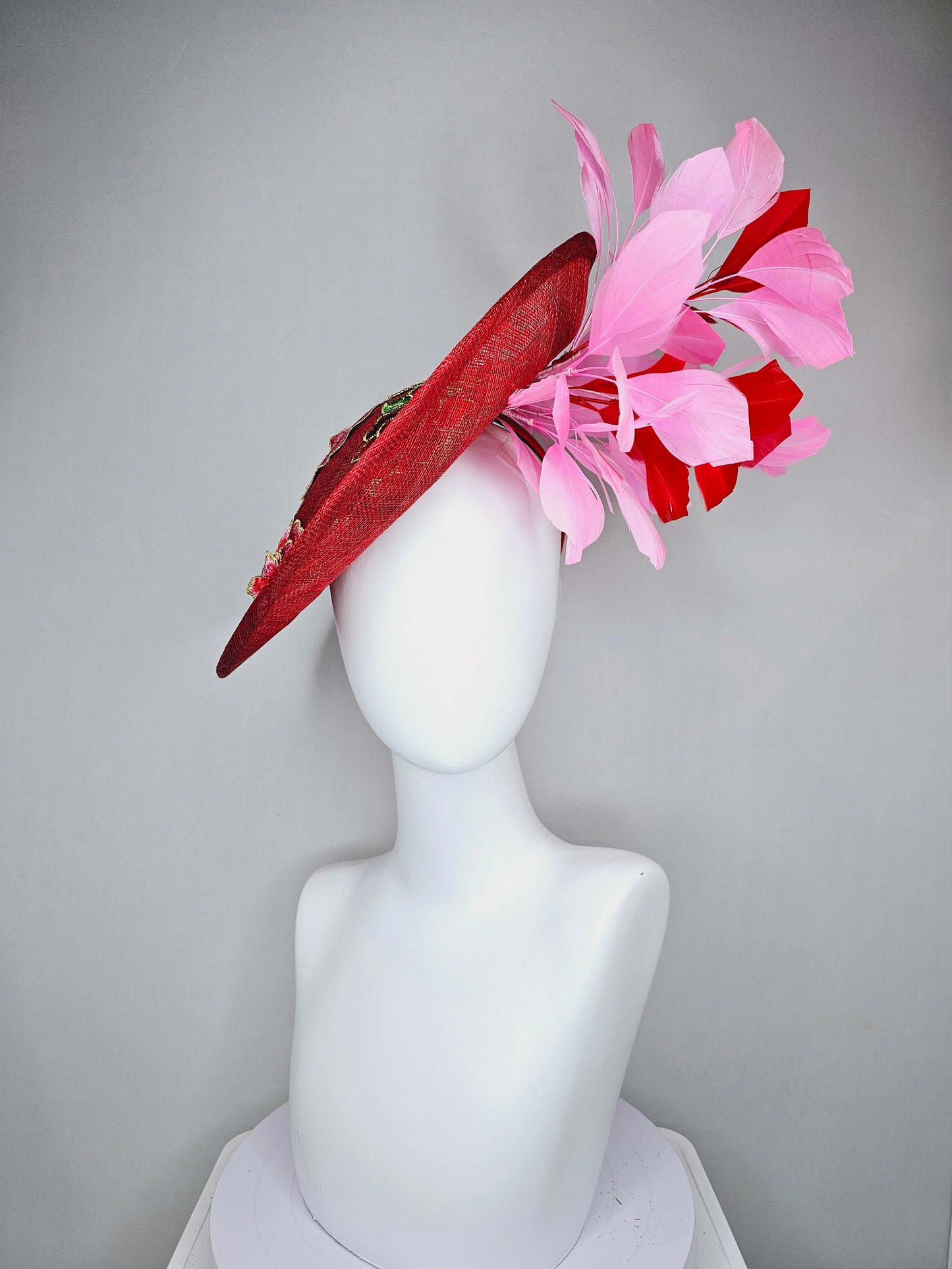 kentucky derby hat fascinator red sinamay saucer with red green gold  embroidered flowers pink and red feathers