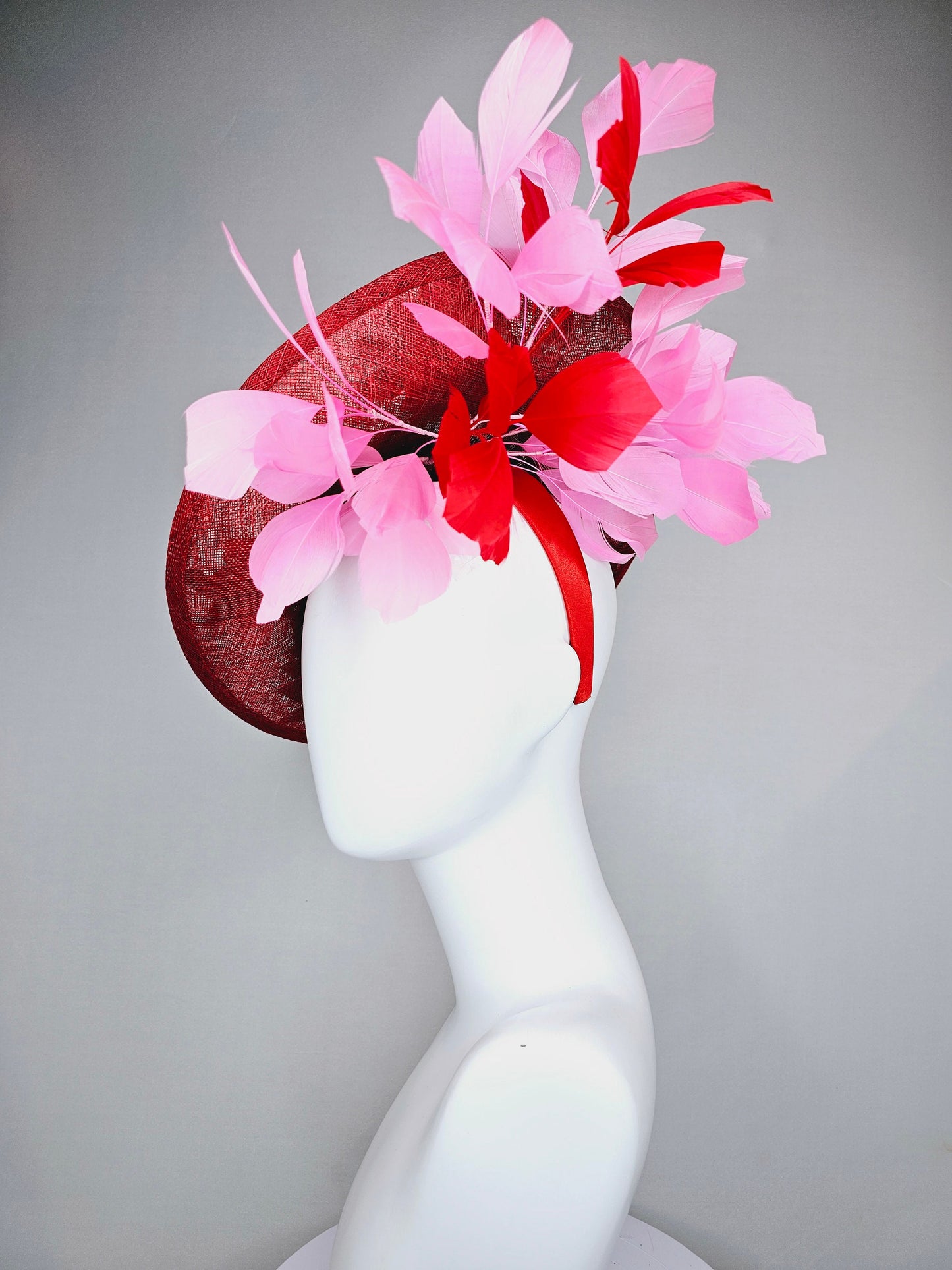 kentucky derby hat fascinator red sinamay saucer with red green gold  embroidered flowers pink and red feathers