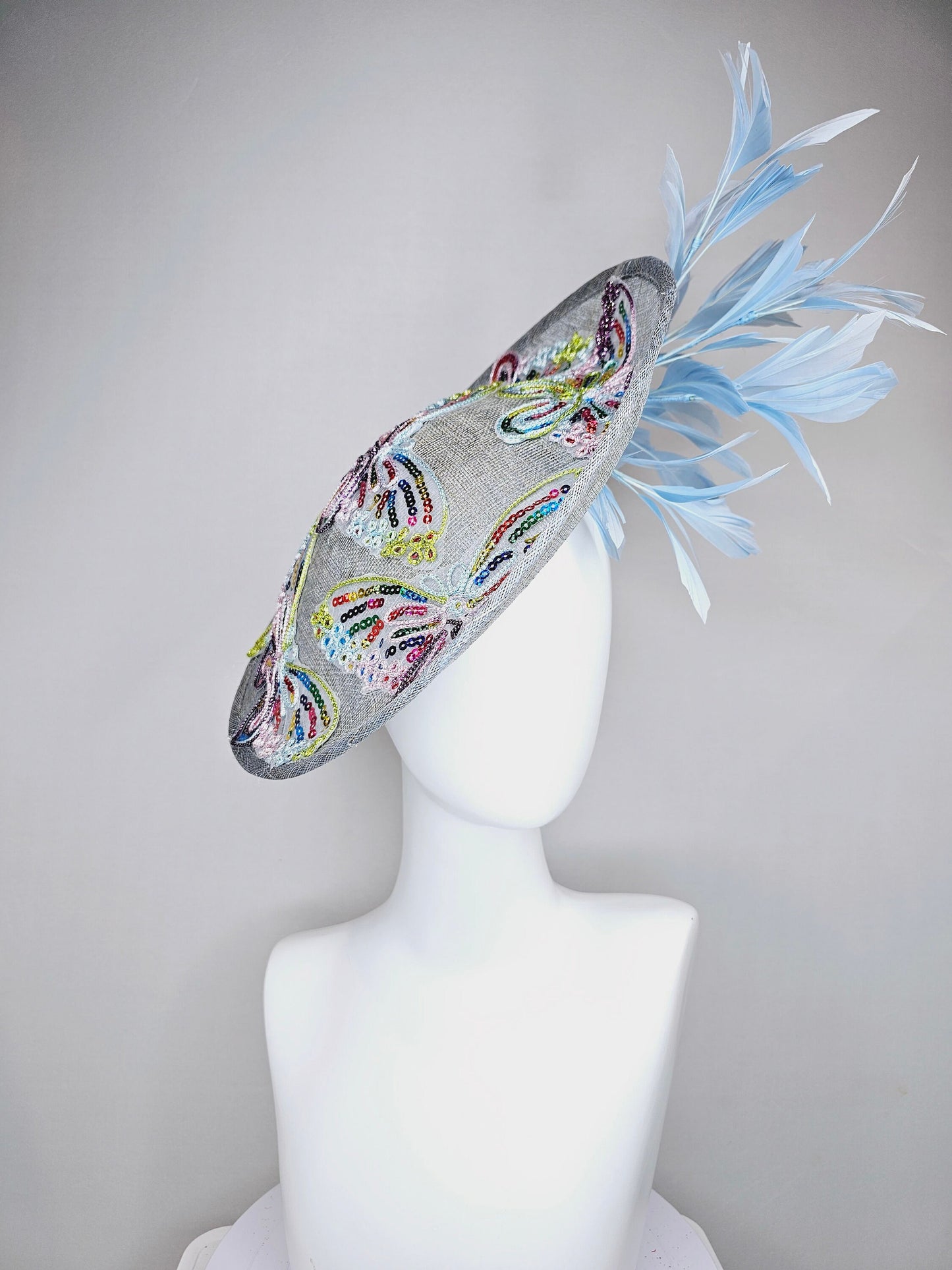 kentucky derby hat fascinator light blue sinamay saucer light blue feathers sequin embroidered rainbow butterflies