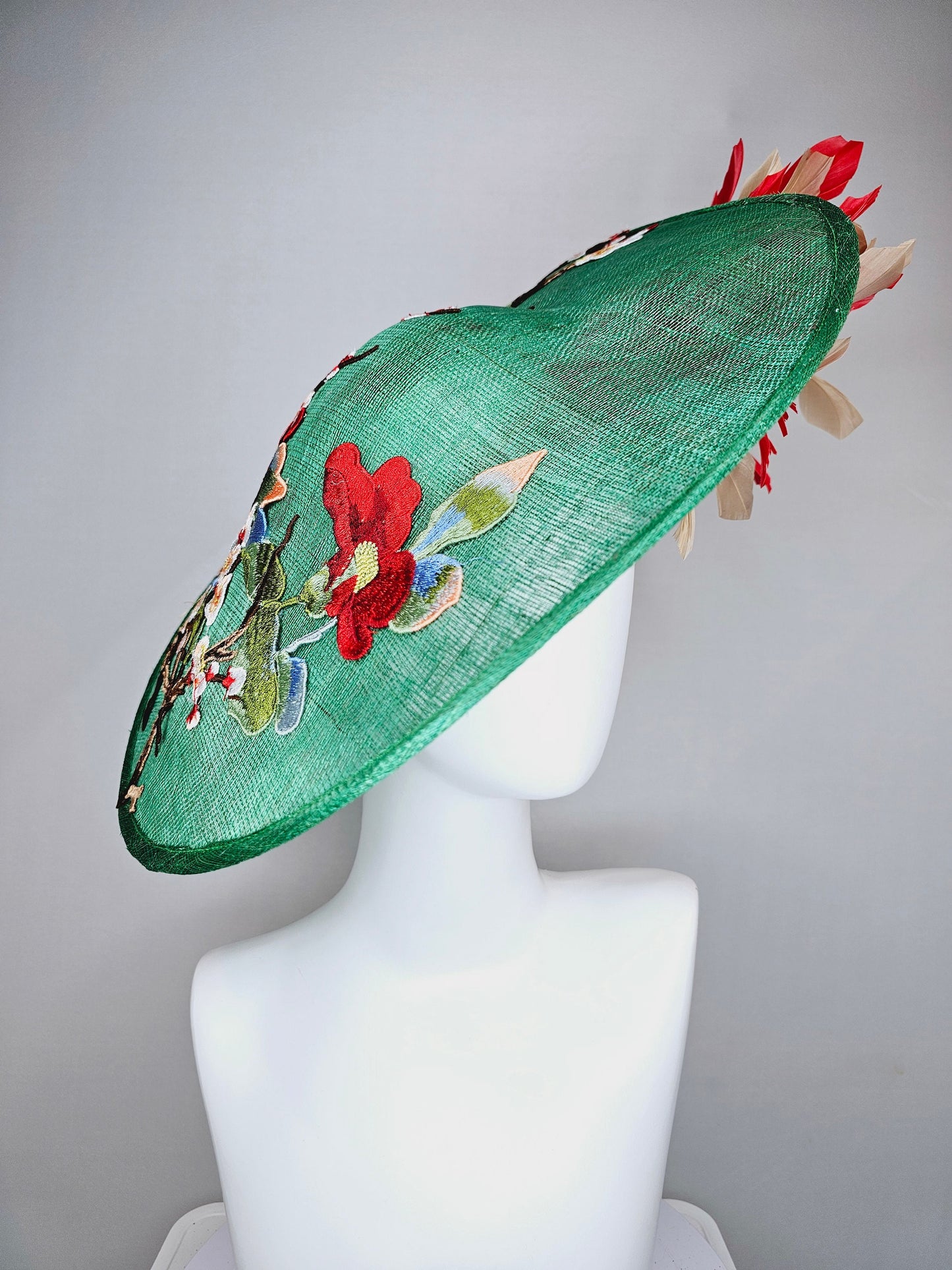 kentucky derby hat fascinator green sinamay saucer with embroidered gold red brown ivory flowers and red and gold  feathers