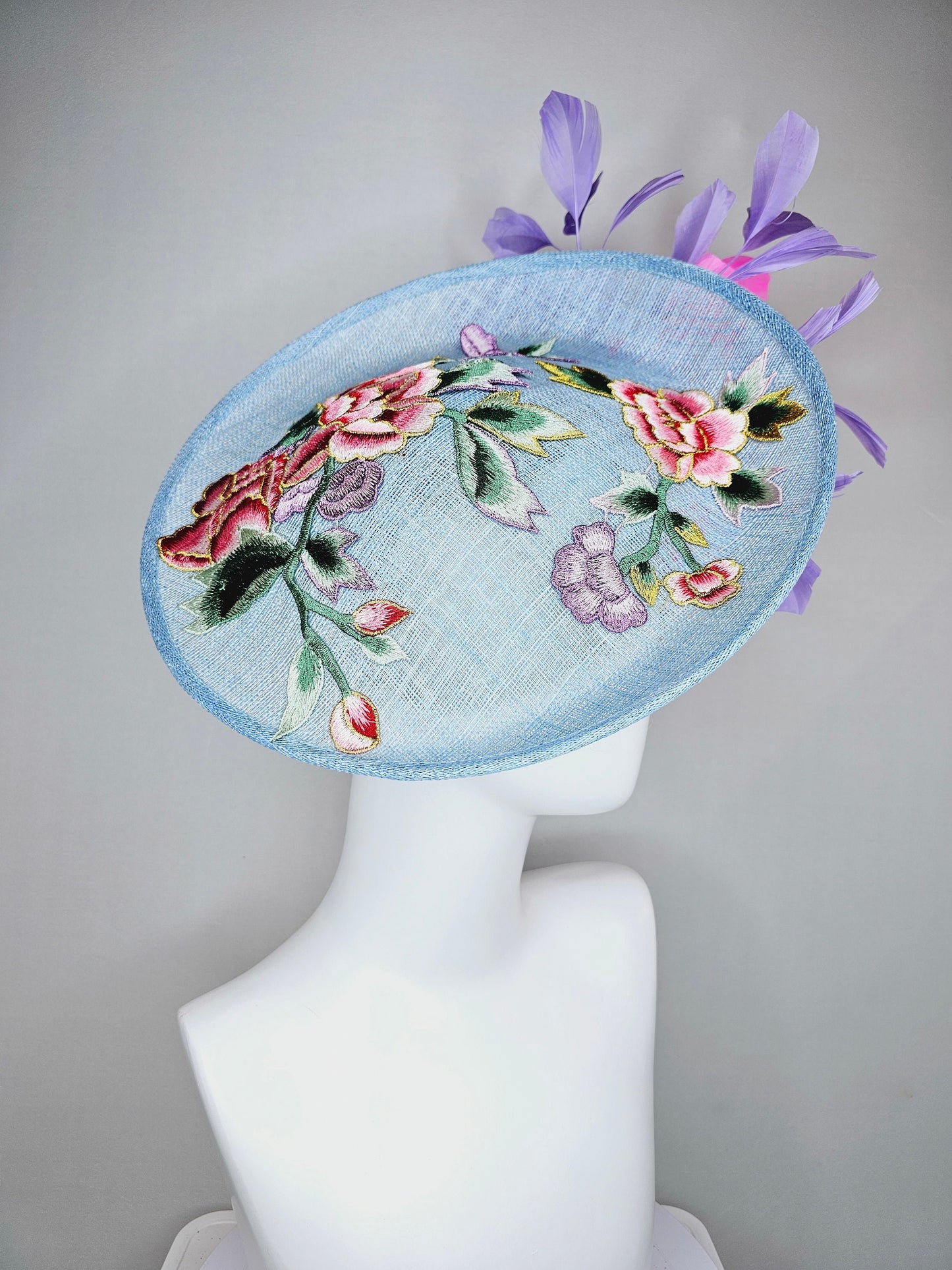 kentucky derby hat fascinator light blue sinamay saucer with embroidered gold pink lavender purple flowers and pink and purple  feathers