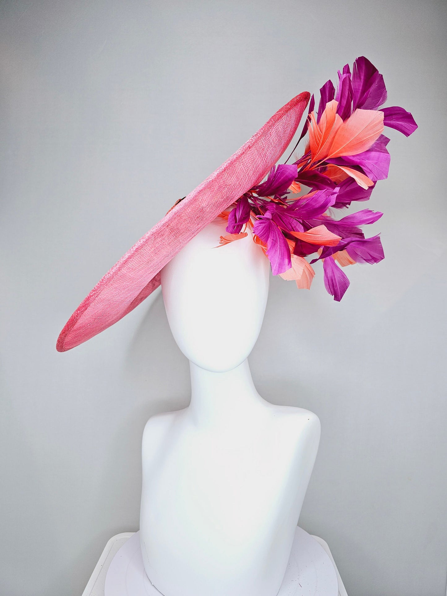 kentucky derby hat fascinator bright pink coral sinamay saucer with lavender purple coral yellow embroidered flowers purple coral  feathers