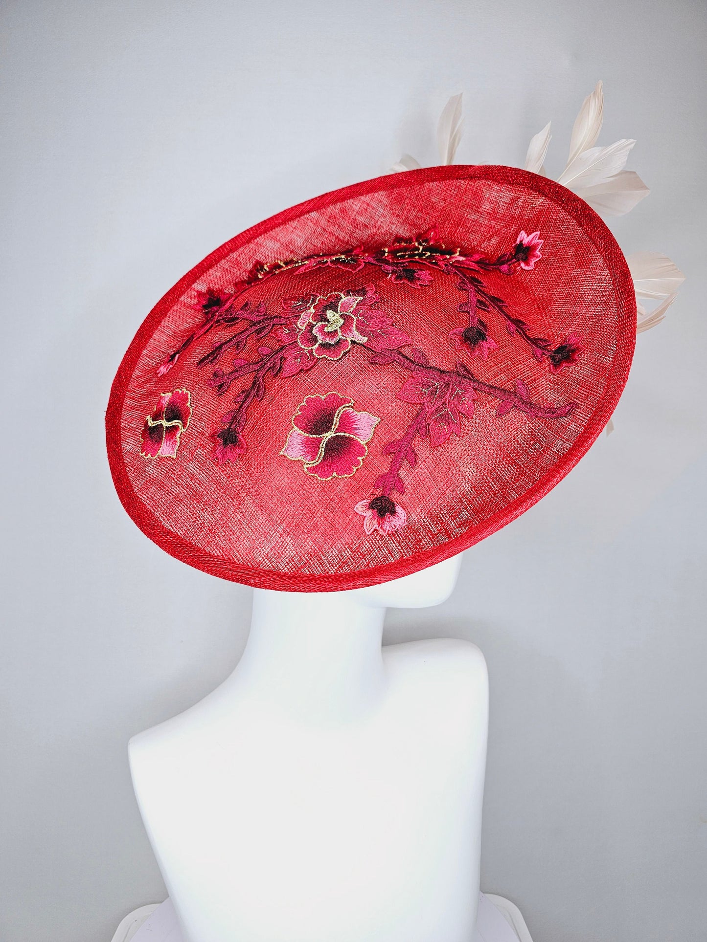 kentucky derby hat red sinamay saucer with red burgundy gold pink embroidered flowers with blush light pink red feathers