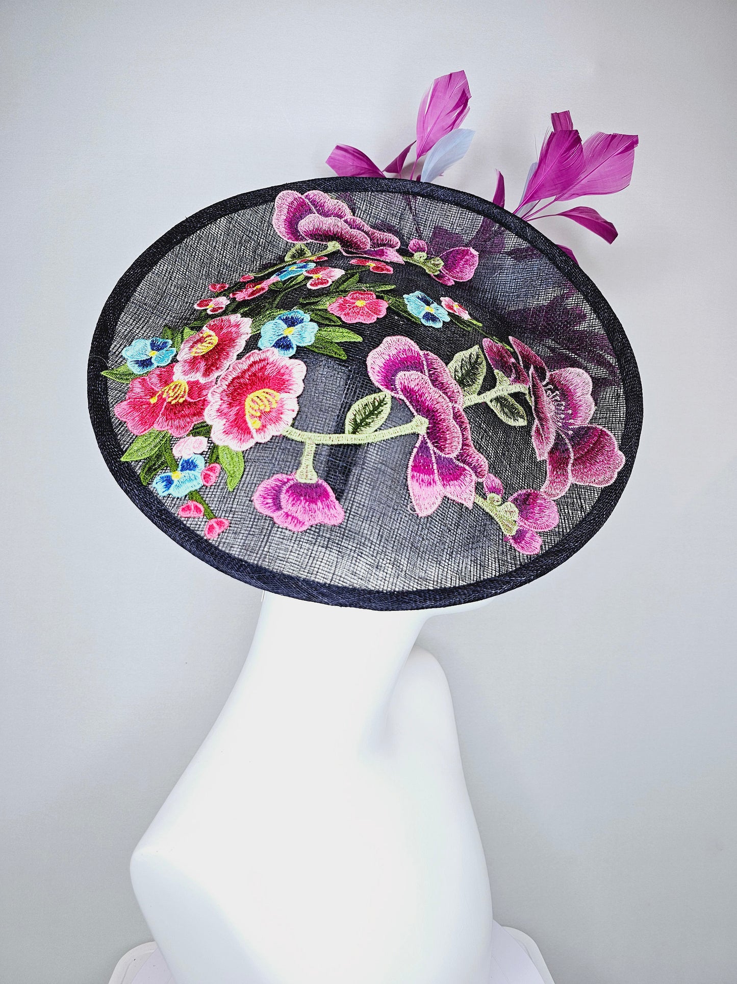 kentucky derby hat navy sinamay saucer with purple lavender pink embroidered flowers with purple and light blue feathers