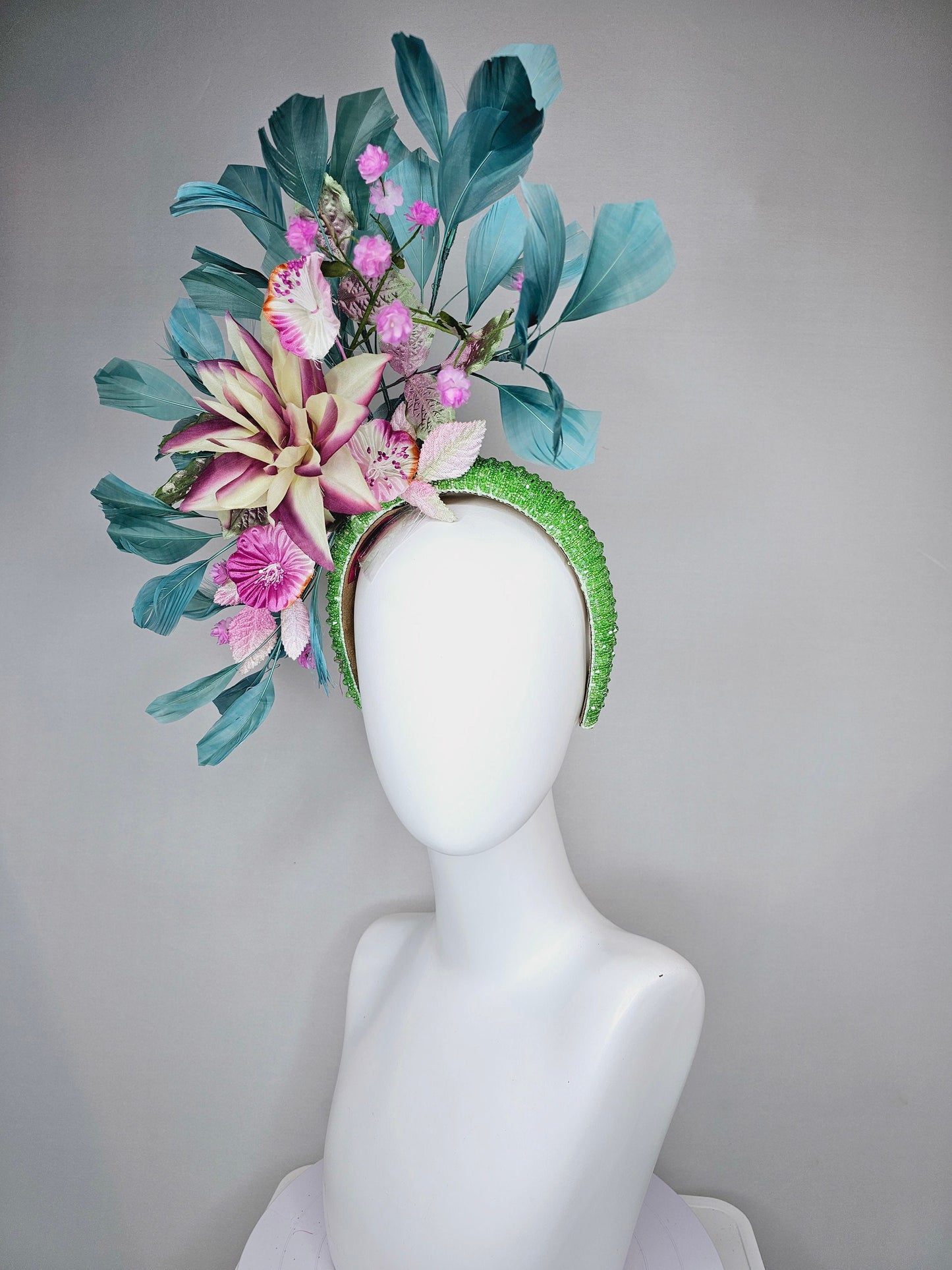 kentucky derby hat fascinator lime green beaded headband with cream purple silk flowers and pink flowers and teal feathers