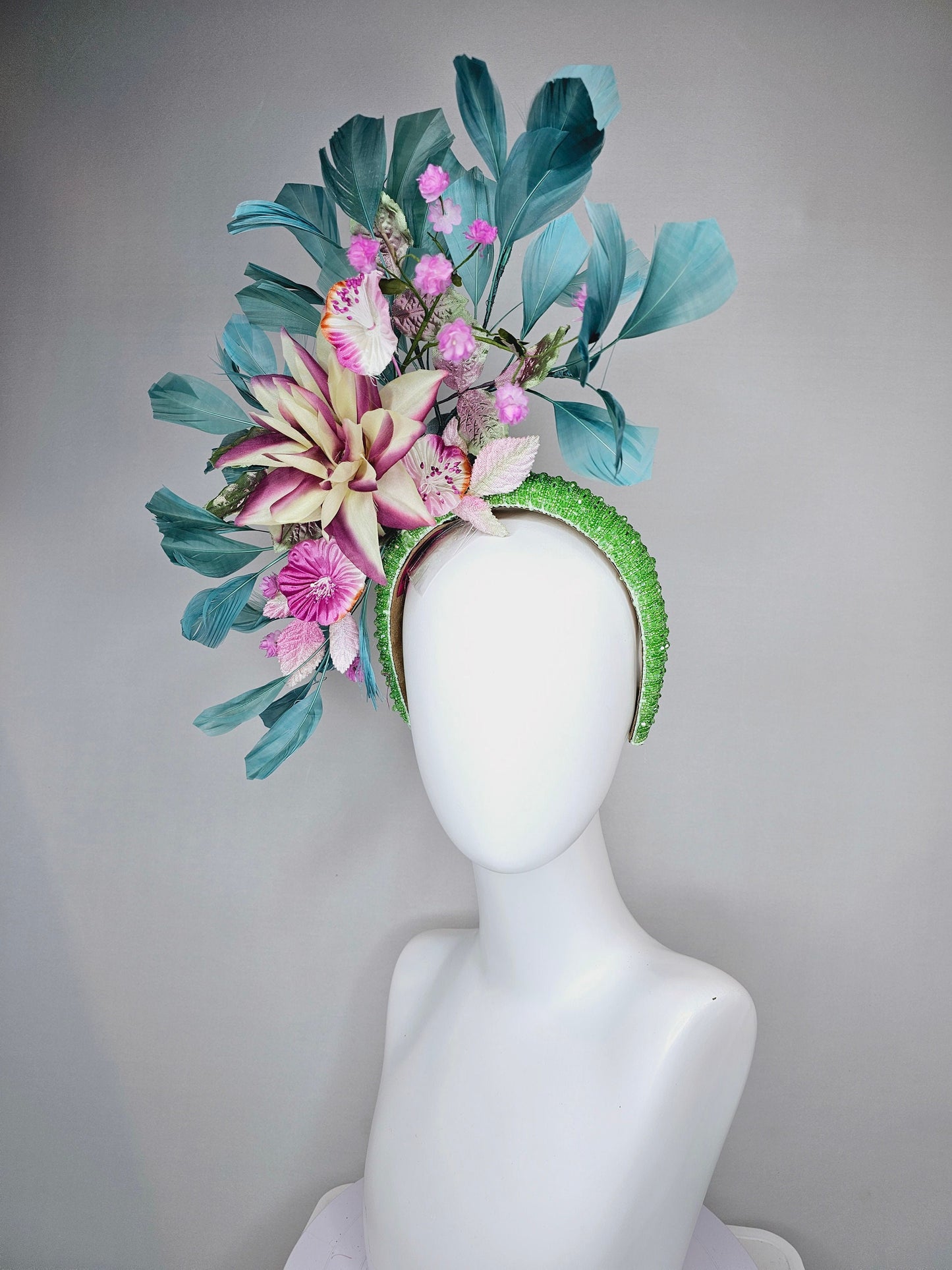 kentucky derby hat fascinator lime green beaded headband with cream purple silk flowers and pink flowers and teal feathers