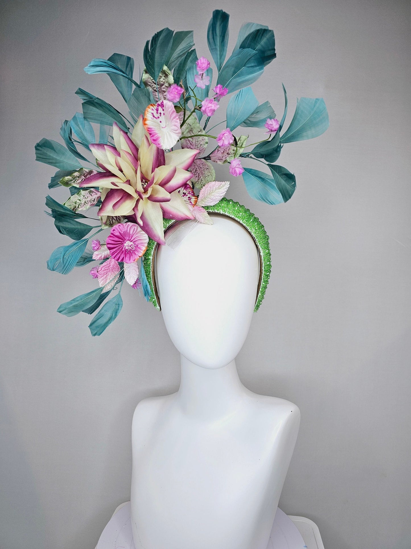 kentucky derby hat fascinator lime green beaded headband with cream purple silk flowers and pink flowers and teal feathers