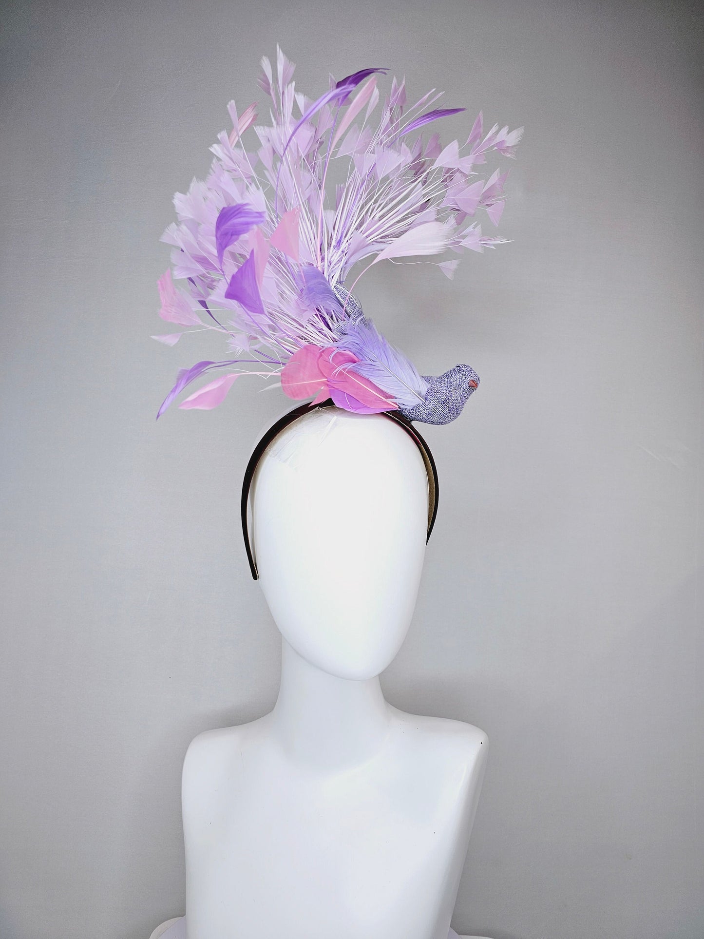 kentucky derby hat fascinator dark brown brunette satin headband with purple bird and purple lavender pink feathers