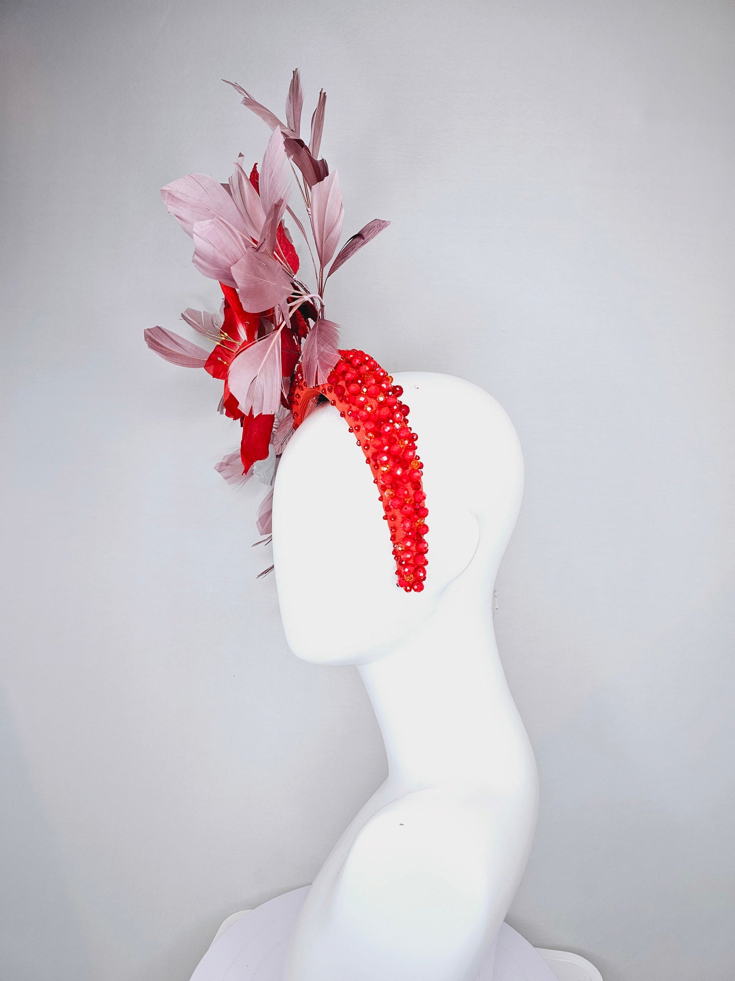 kentucky derby hat fascinator large red flower with red and white leaves with blush pink feathers on red crystal beaded headband