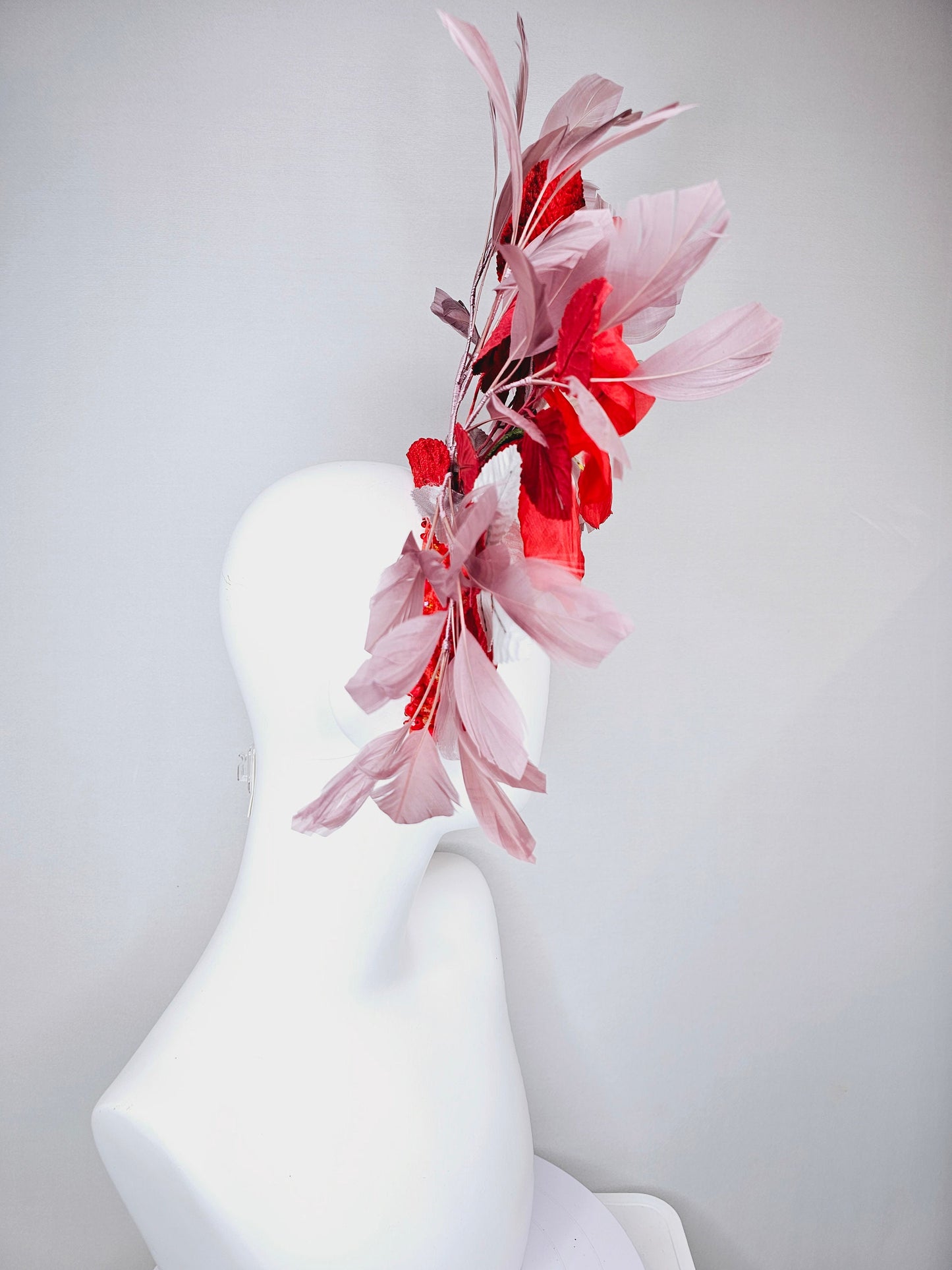 kentucky derby hat fascinator large red flower with red and white leaves with blush pink feathers on red crystal beaded headband