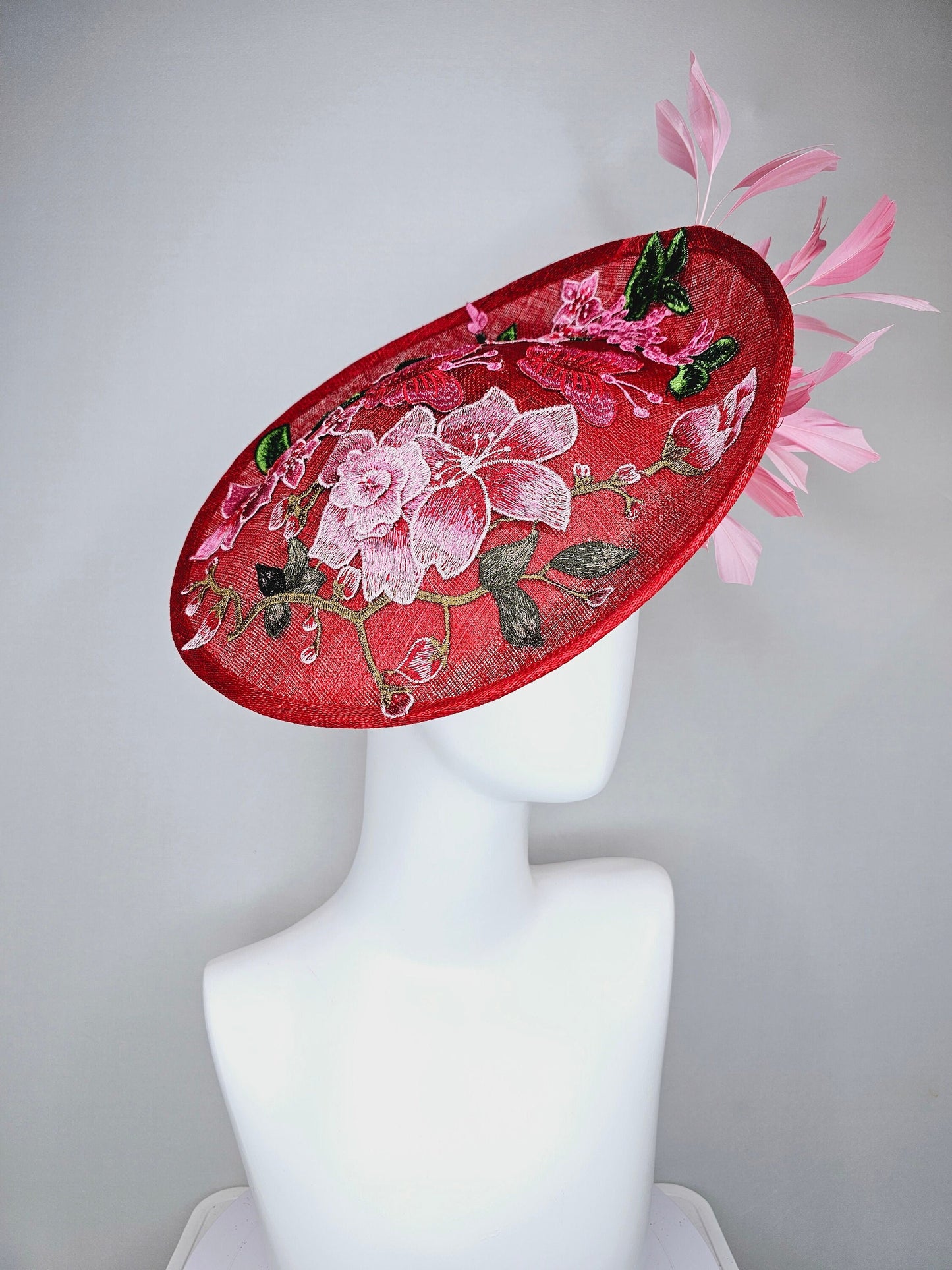 kentucky derby hat fascinator red sinamay saucer with red pink green gold  embroidered flowers pink feathers