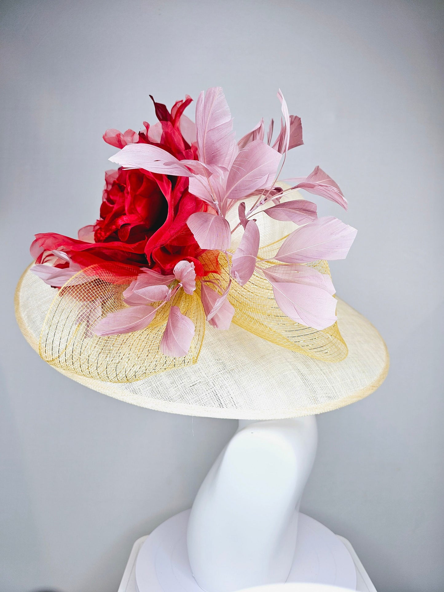 kentucky derby hat large wide brim sinamay neutral taupe beige hat with large red organza flower and blush pink feathers with gold crinoline