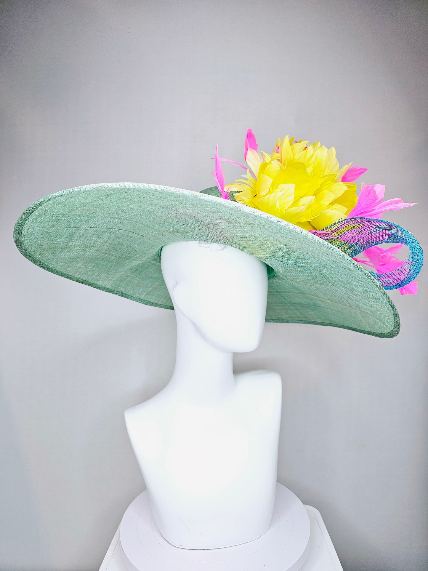 kentucky derby hat large wide brim sinamay teal blue green hat w bright yellow feather flowers and pink feathers with teal blue crinoline