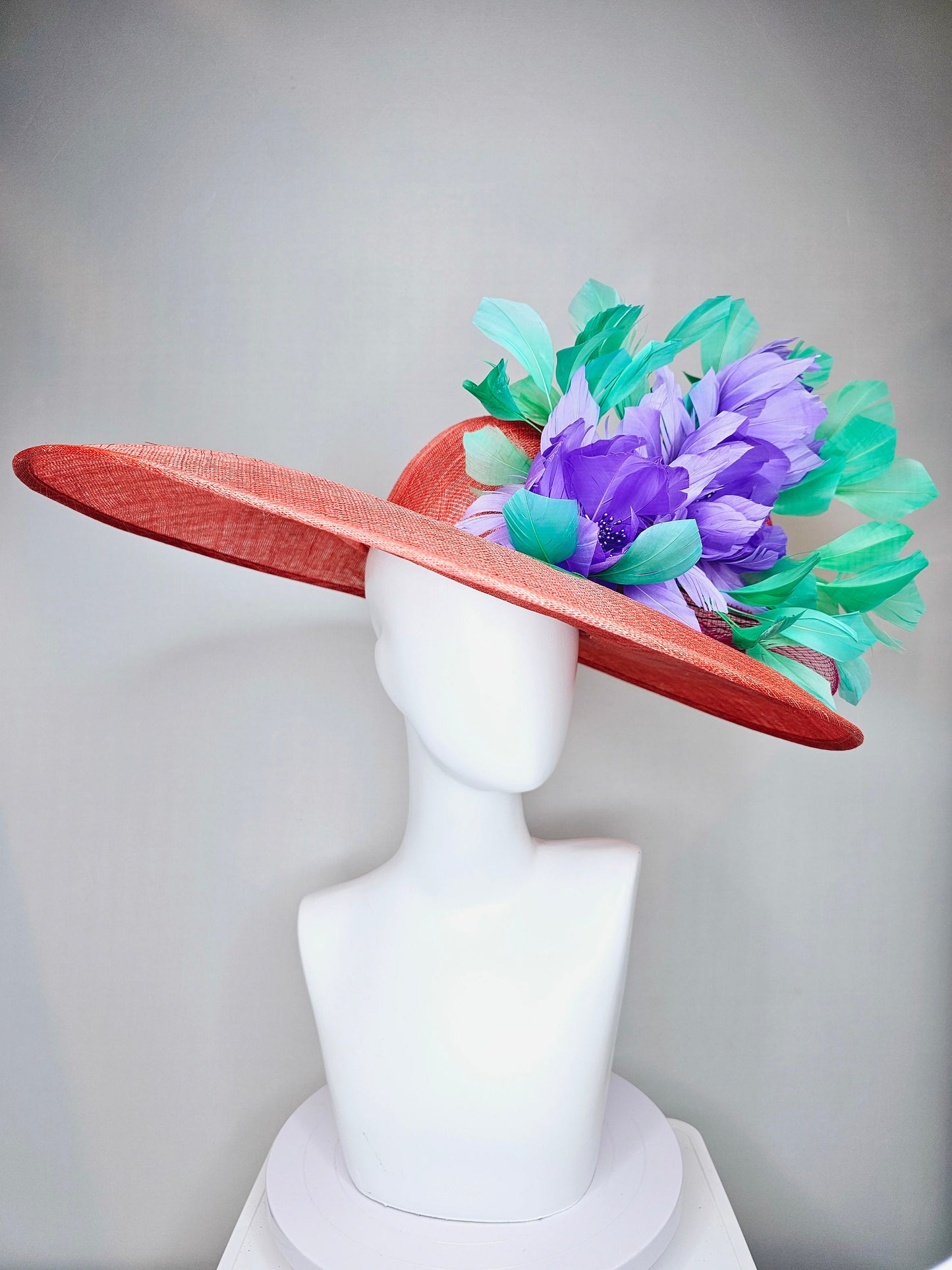 kentucky derby hat large wide brim sinamay orange coral hat with green feathers and purple fluffy feather flowers w pink crinoline