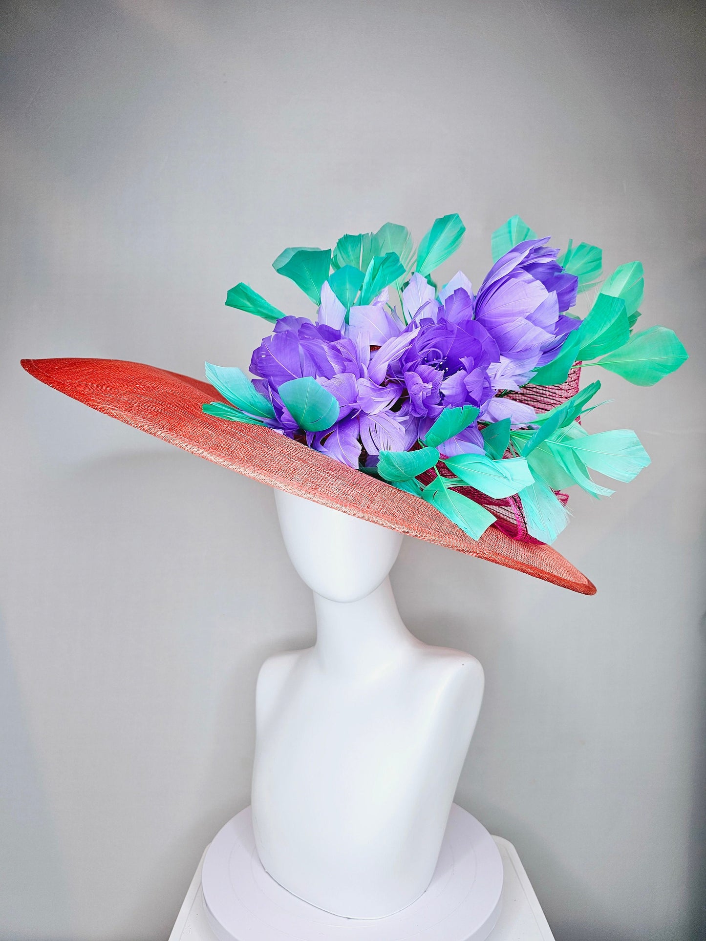 kentucky derby hat large wide brim sinamay orange coral hat with green feathers and purple fluffy feather flowers w pink crinoline