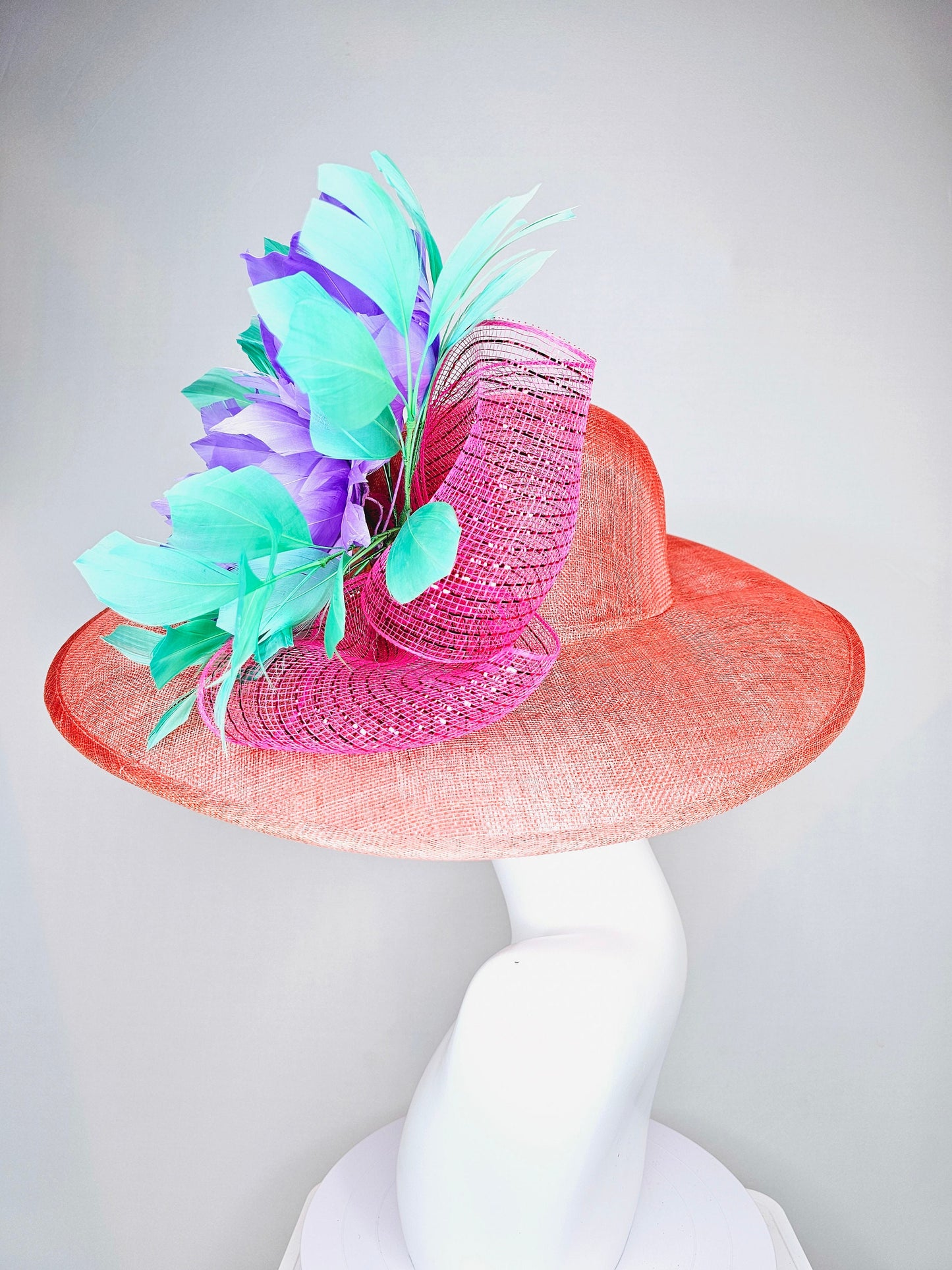 kentucky derby hat large wide brim sinamay orange coral hat with green feathers and purple fluffy feather flowers w pink crinoline