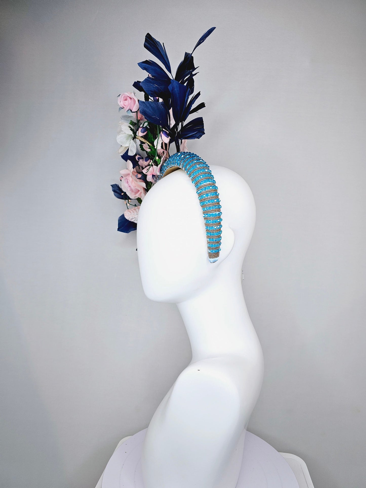 kentucky derby hat fascinator turquoise blue crystal rhinestone headband light pink roses and white flowers with navy blue feathers