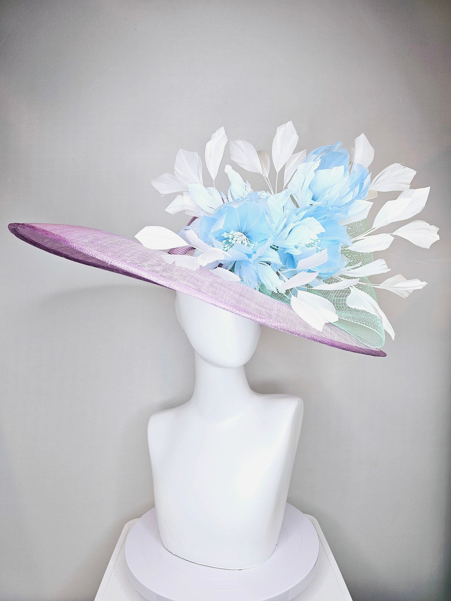 kentucky derby hat large wide brim sinamay purple lavender hat with baby blue feather flowers, white ivory feathers and mint green crinoline