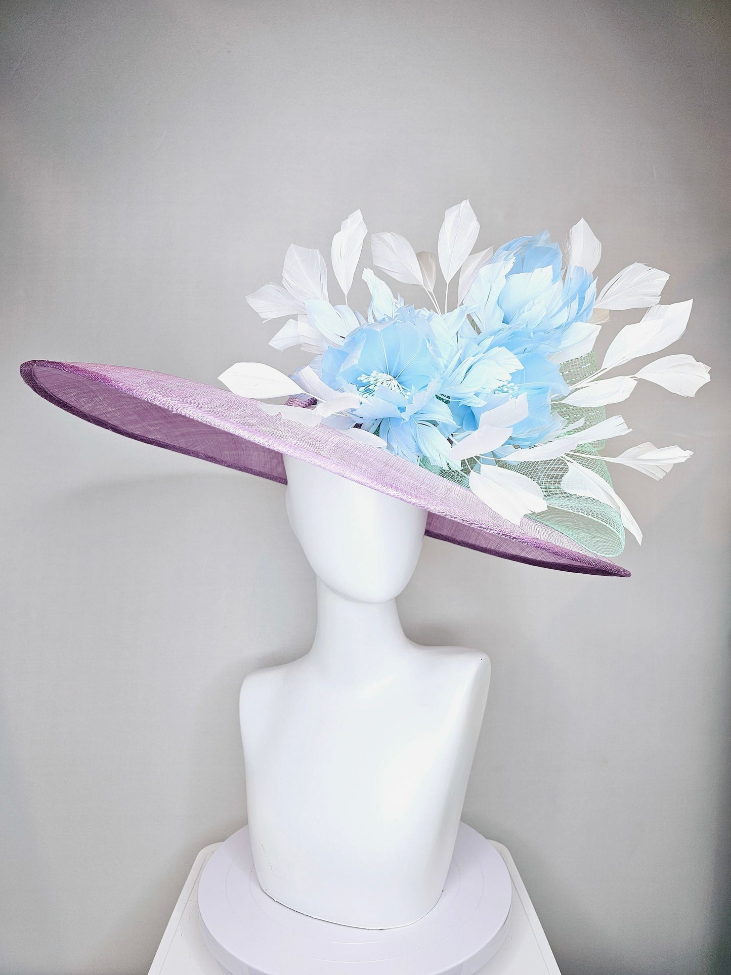 kentucky derby hat large wide brim sinamay purple lavender hat with baby blue feather flowers, white ivory feathers and mint green crinoline