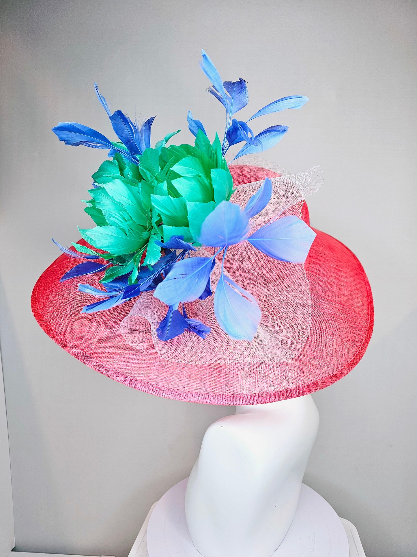 kentucky derby hat large wide brim sinamay coral hat w emerald green feather flowers, royal blue feathers and white ivory crinoline